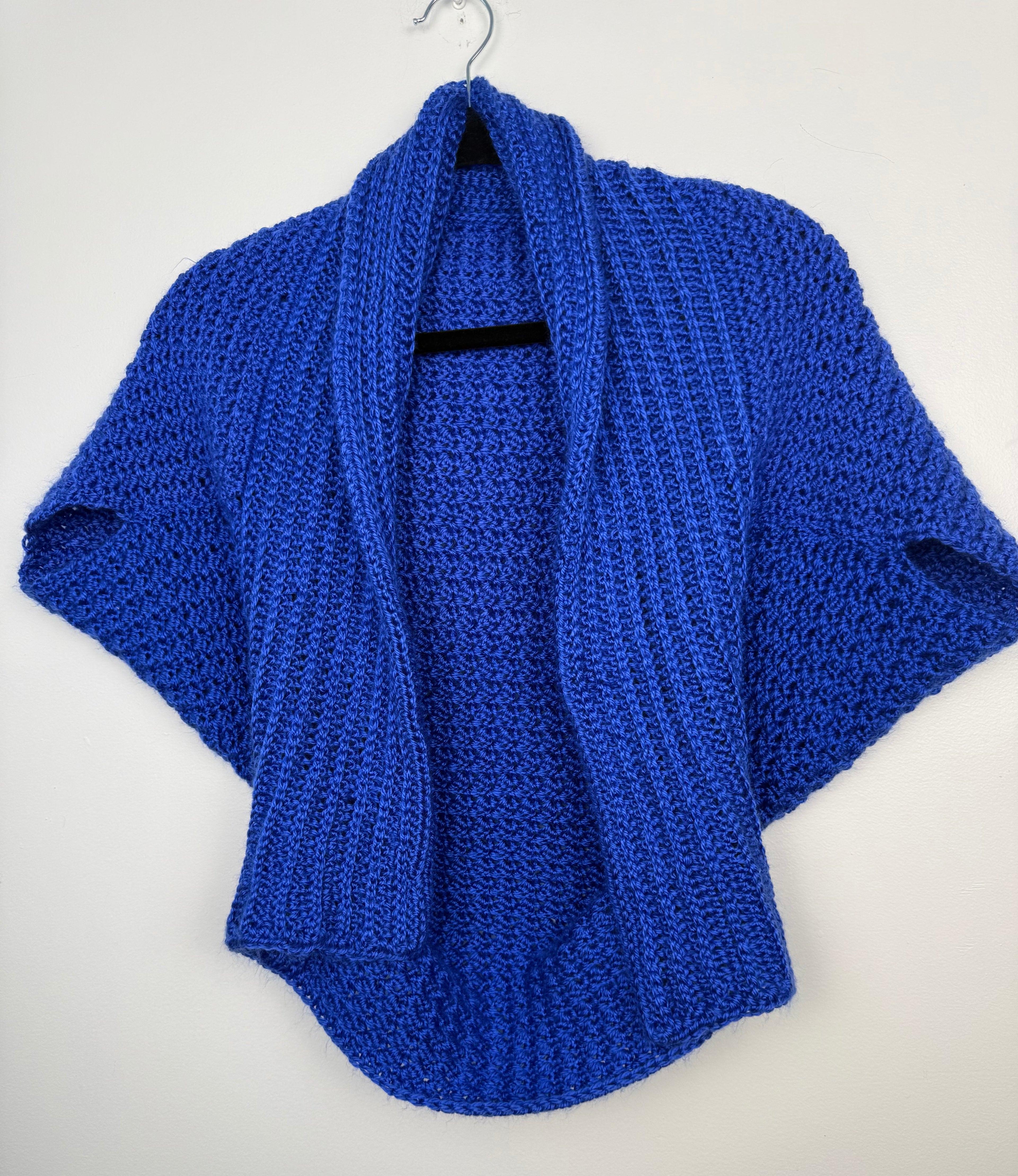 Hand Knit Bolero Convertible Shrug on hanger
