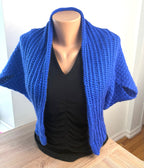 Hand Knit Bolero Convertible Shrug on mannequin 