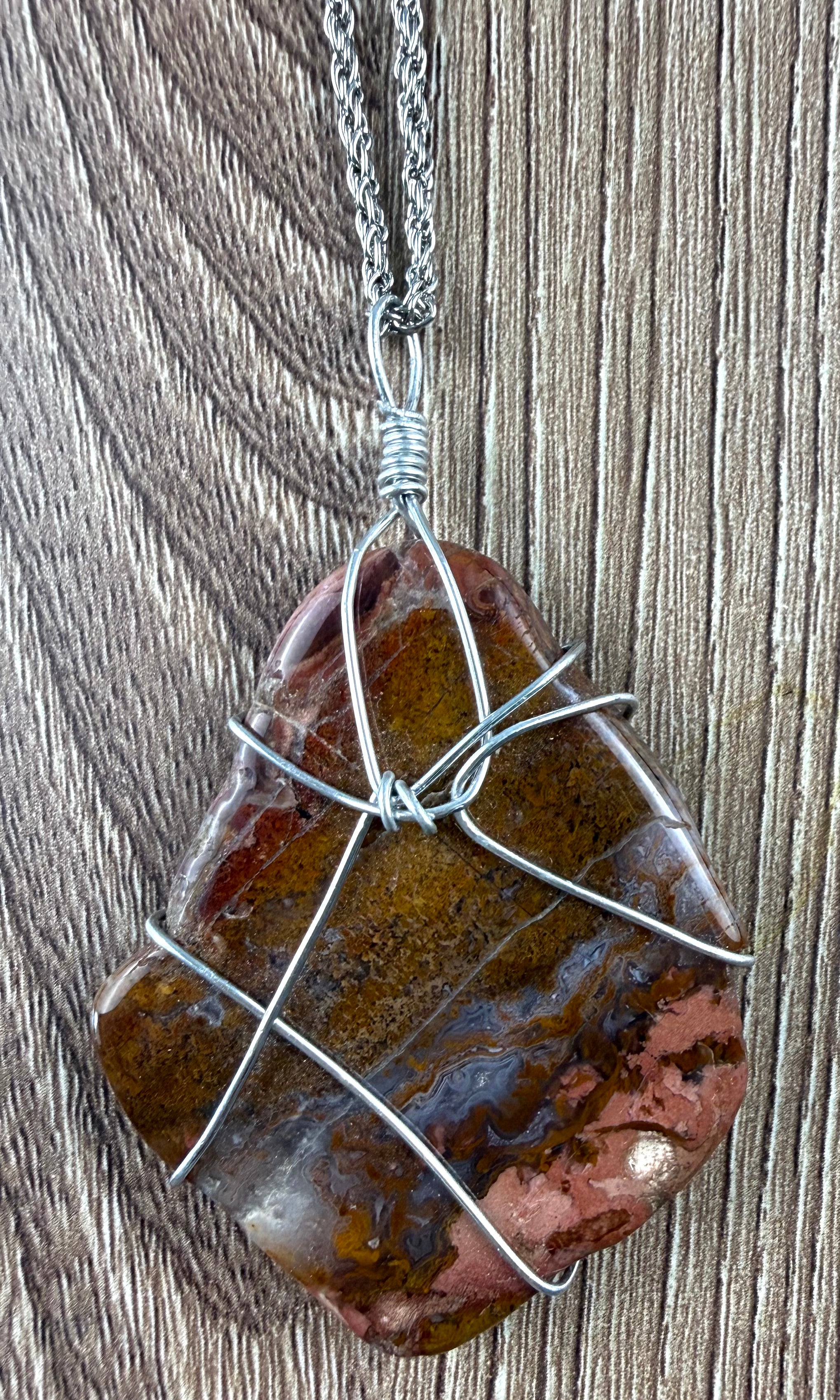 Handcrafted wire-wrapped genuine jasper stone pendant necklace on silver rope chain at Blue Sparrow Shop - close up of pendant 