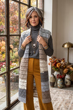 Handmade Long Vest | Size S on woman wearing mustard pants standing by window