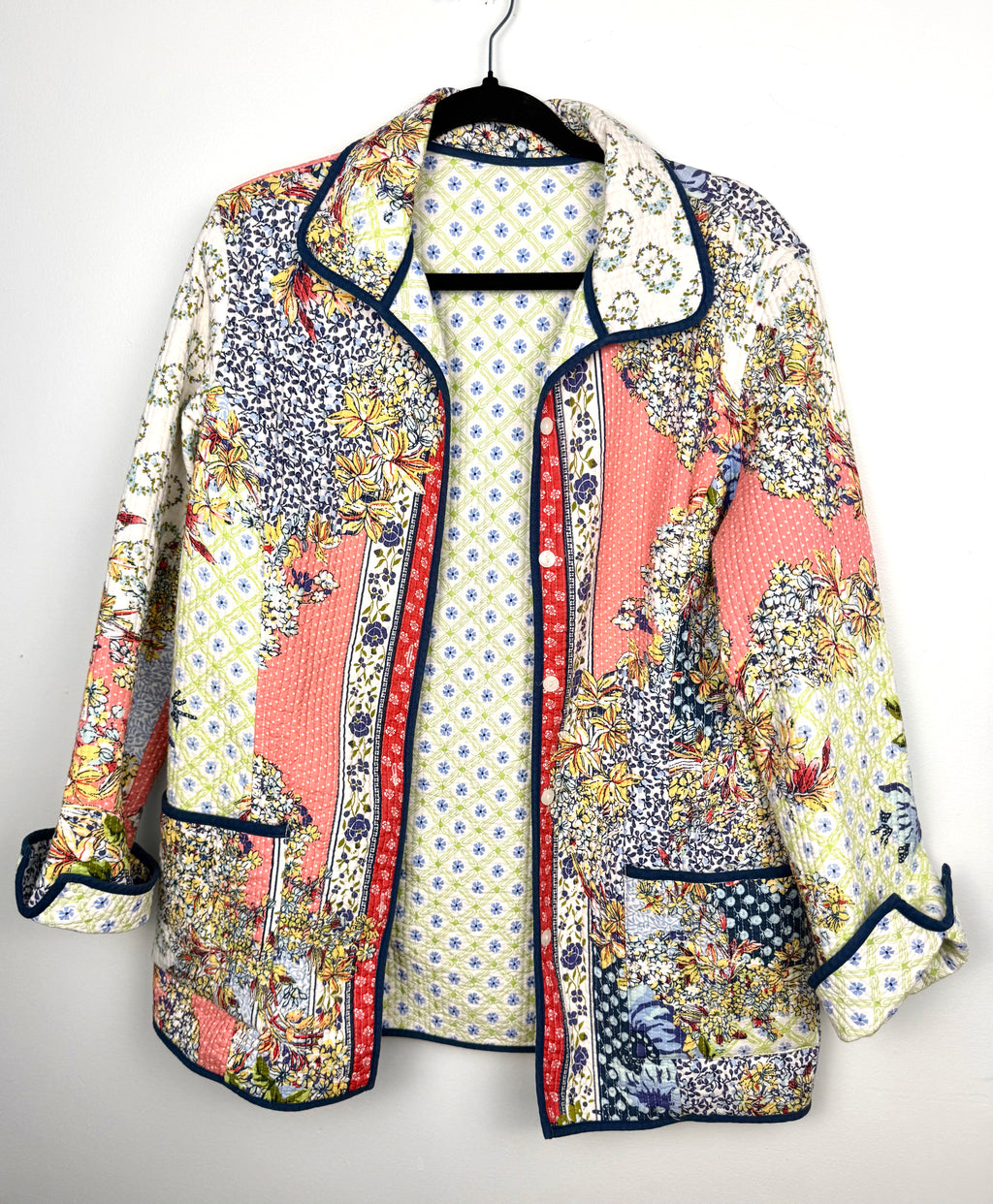 Handmade Reversible Quilted Patchwork Jacket on hanger