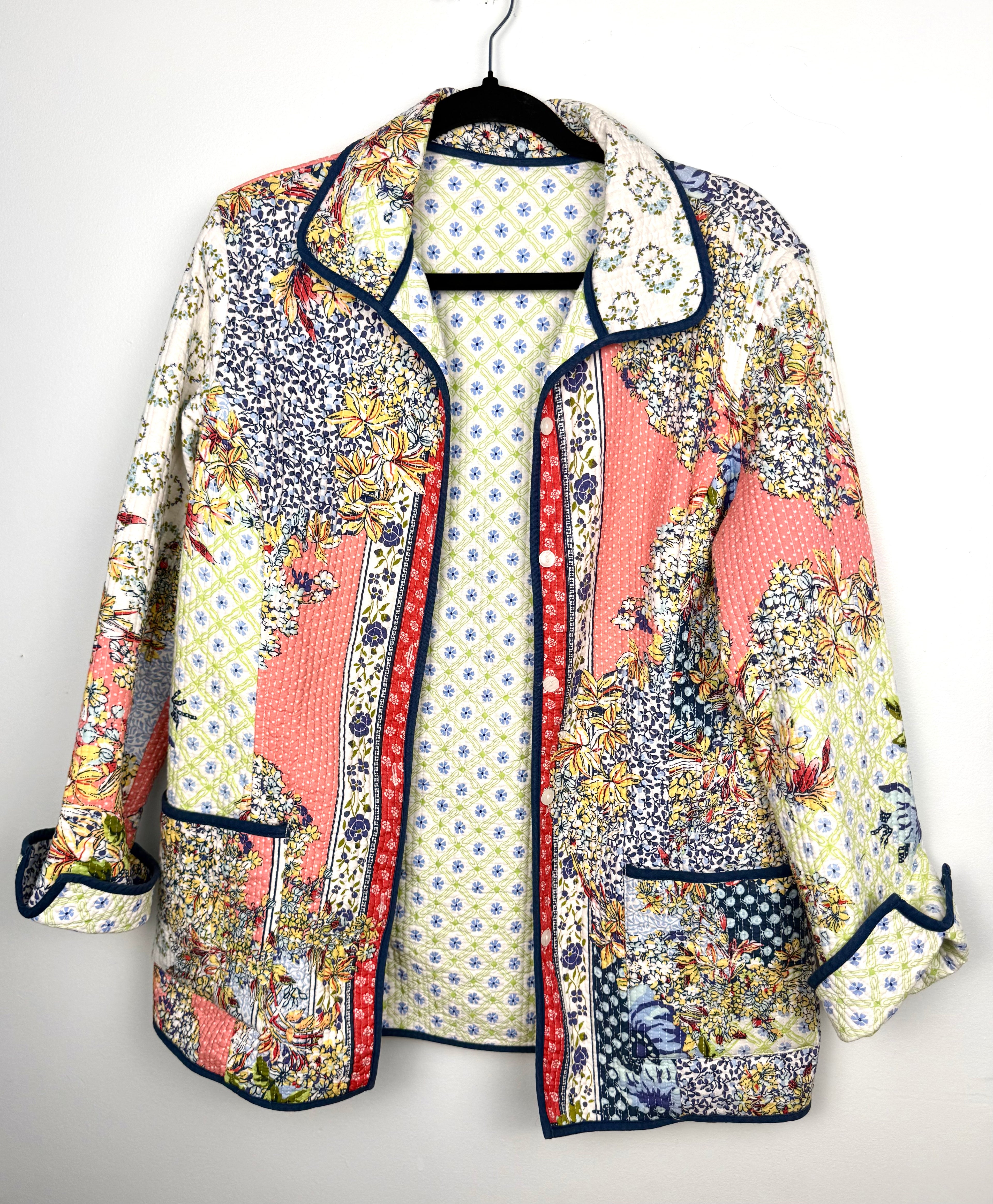 Handmade Reversible Quilted Patchwork Jacket on hanger