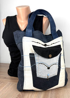 Handmade Upcycled Denim Patchwork Tote Bag  beside mannequin  front view 