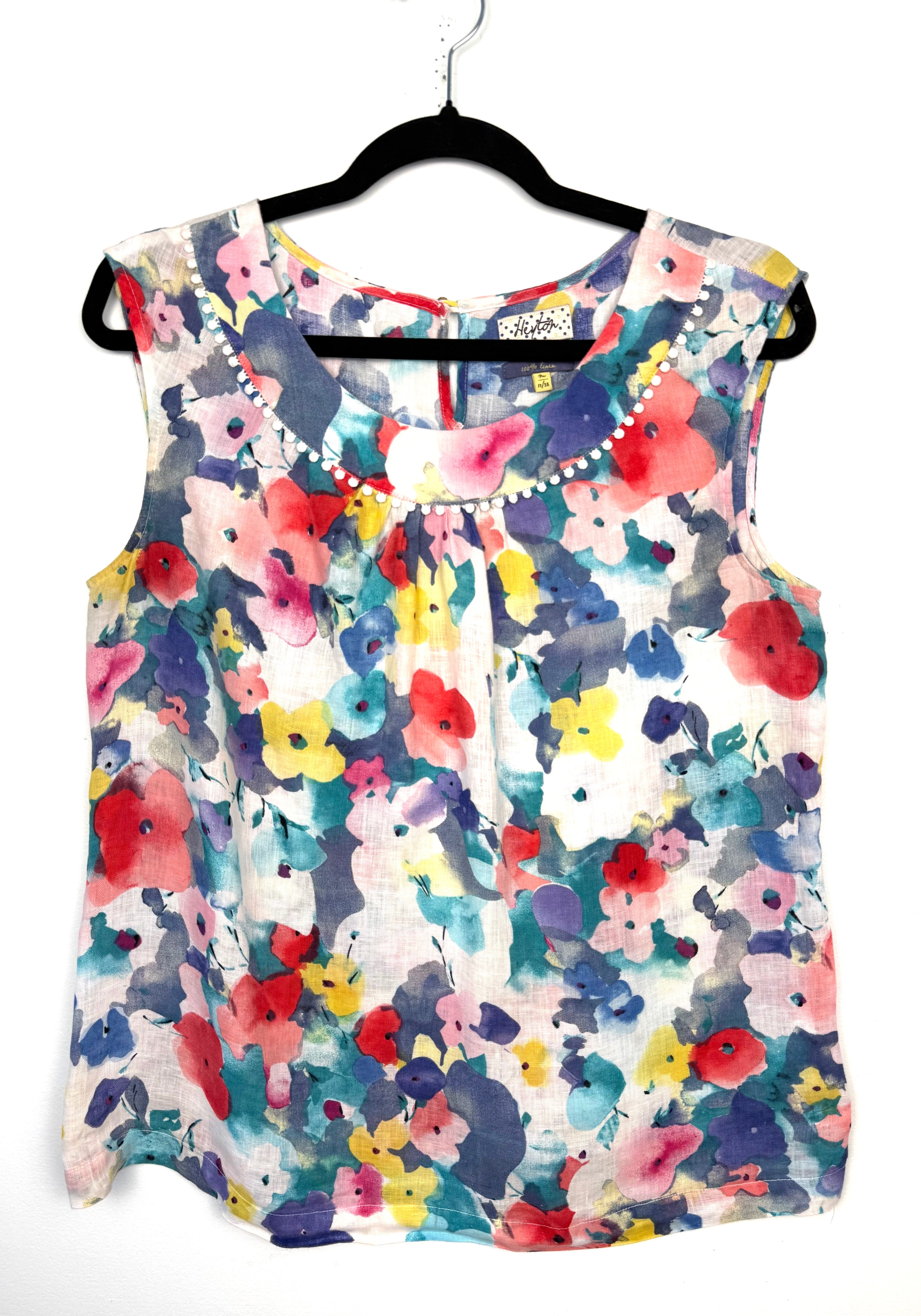 Heyton 100% Linen Watercolour Floral Shell Top — Pom-Pom Neckline | Size 12 at Blue Sparrow Shop  on hanger