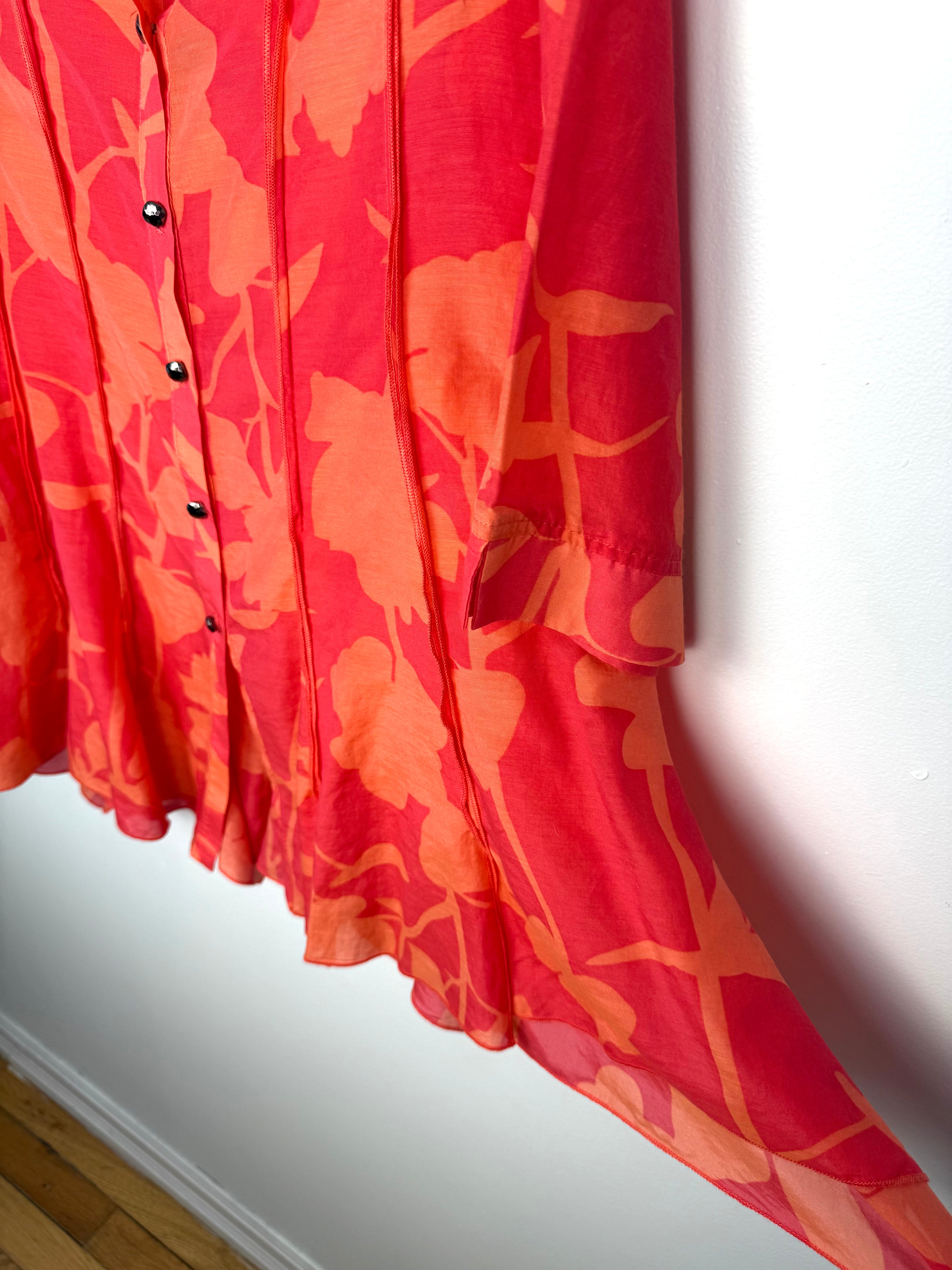 IC by Connie K Silk Blend Blouse in coral and orange showing hem flow 