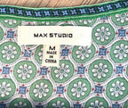 Inside label Max Studio ss top with geometric pattern in green and blue size M
