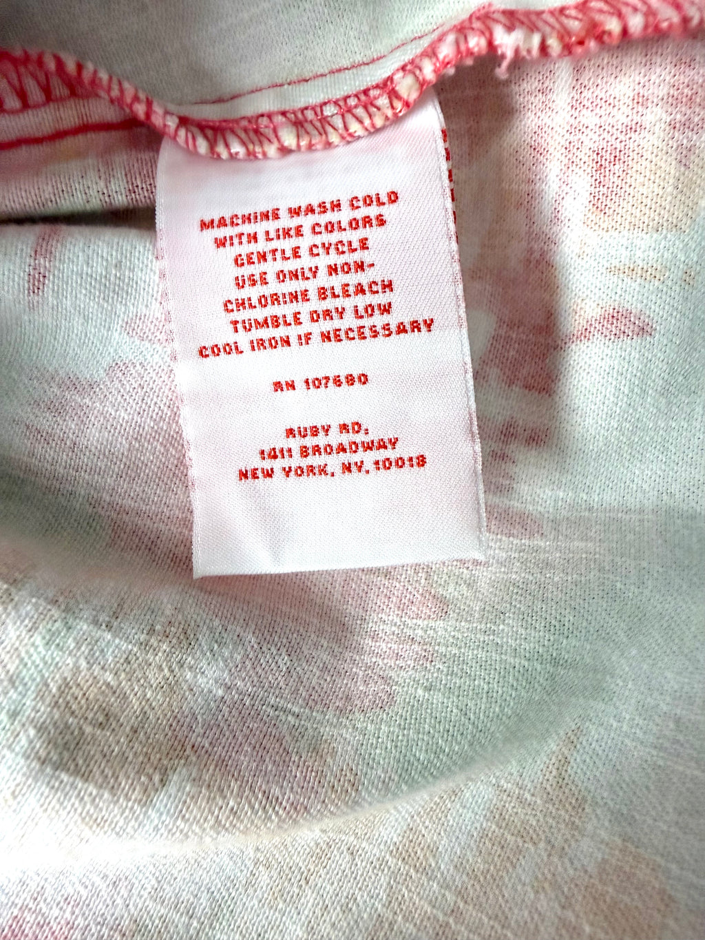 Inside tag on Ruby Red Multi Coloured denim style jacket 