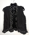 Interior lining and ruffle trim detail black vest