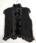 Interior lining and ruffle trim detail black vest