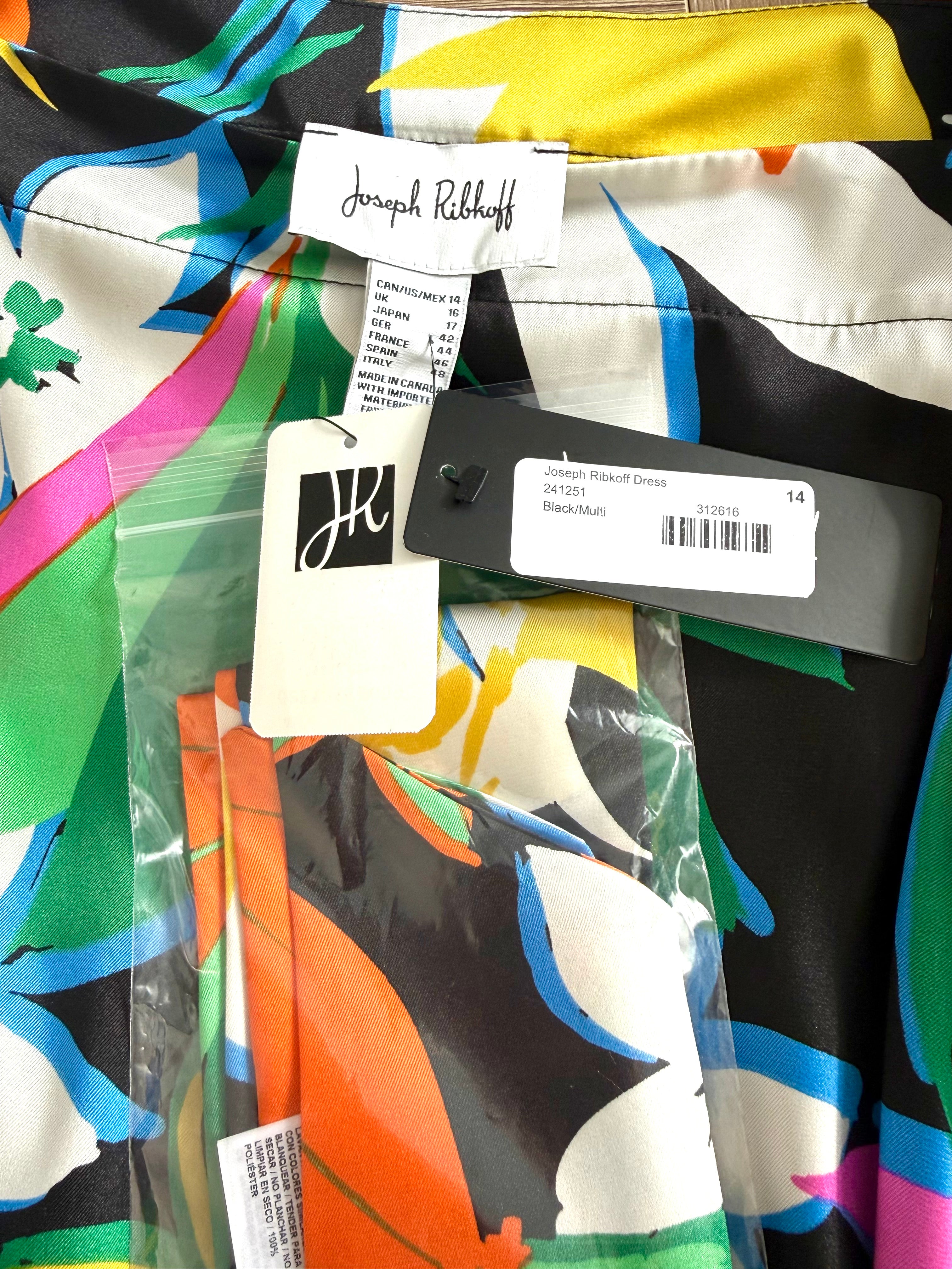 Colorful fabric with a brand tag and labels on a multicolored background Joseph Ribkoff NWT dress 