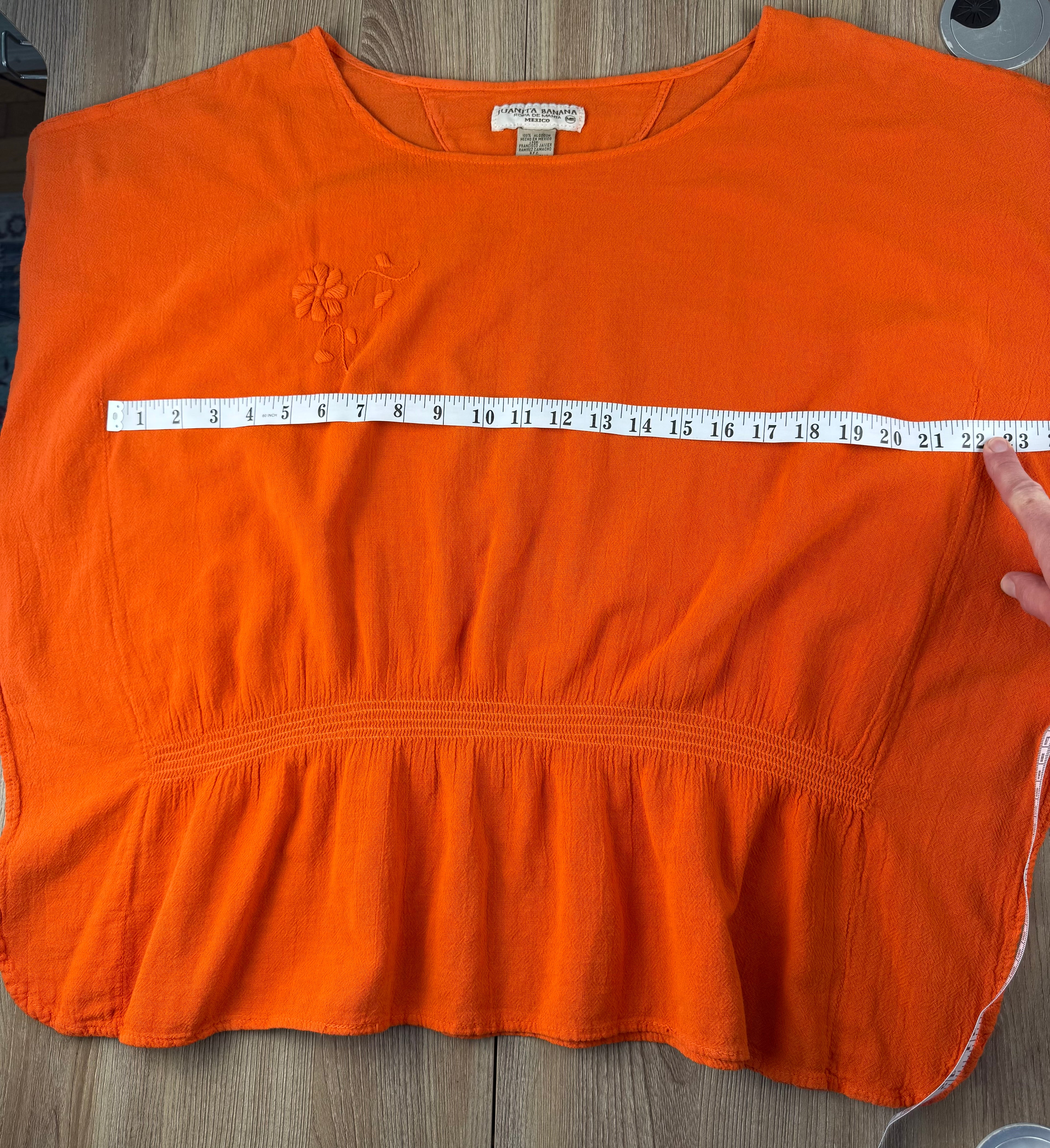 Juanita Banana artisan-made Mexican 100% cotton burnt orange batwing peplum top size M — Blue Sparrow pre-loved women's fashion measuring 44" from side seam to side seam