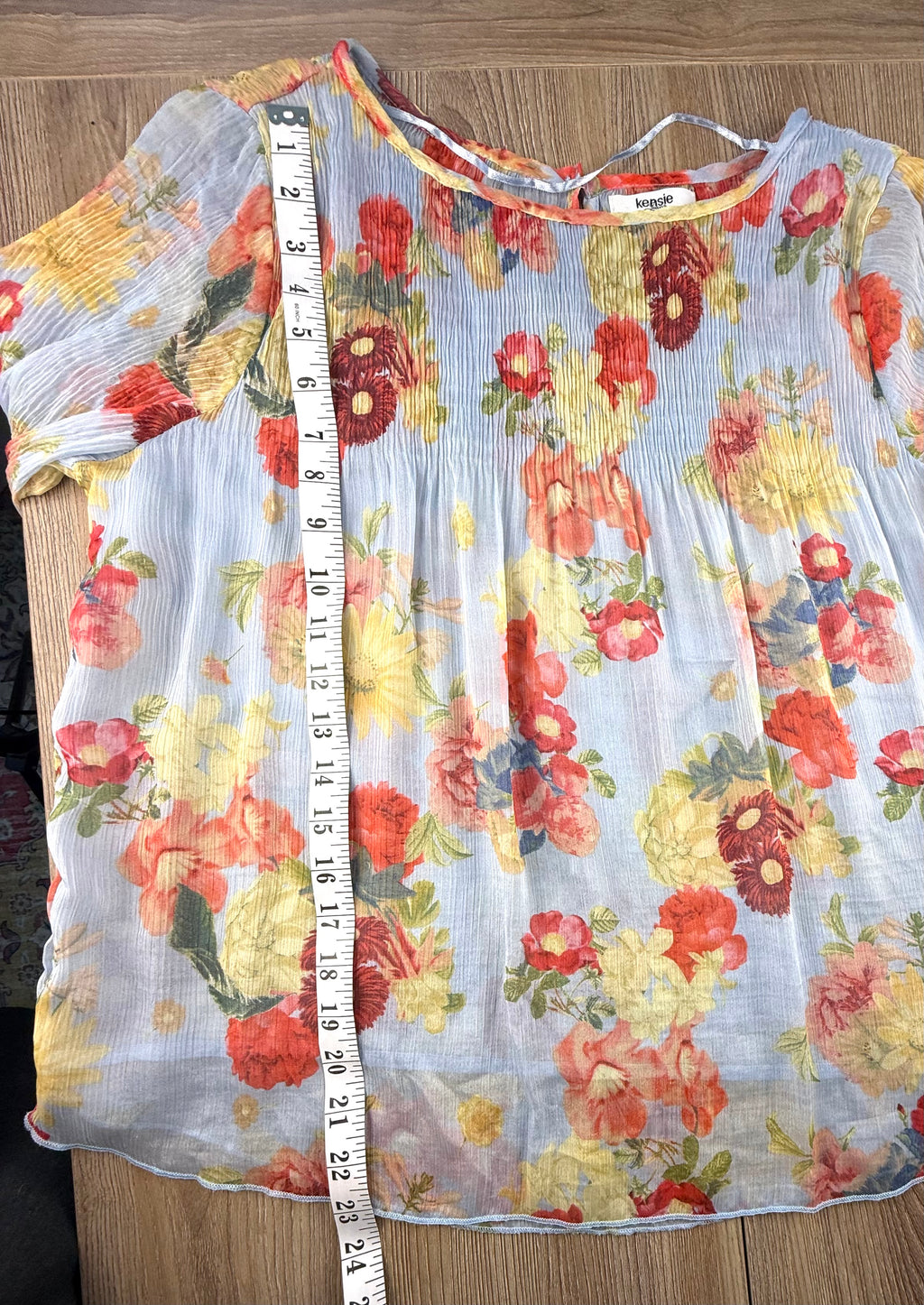 Kensie sheer floral top measuring 23" shoulder to hem 