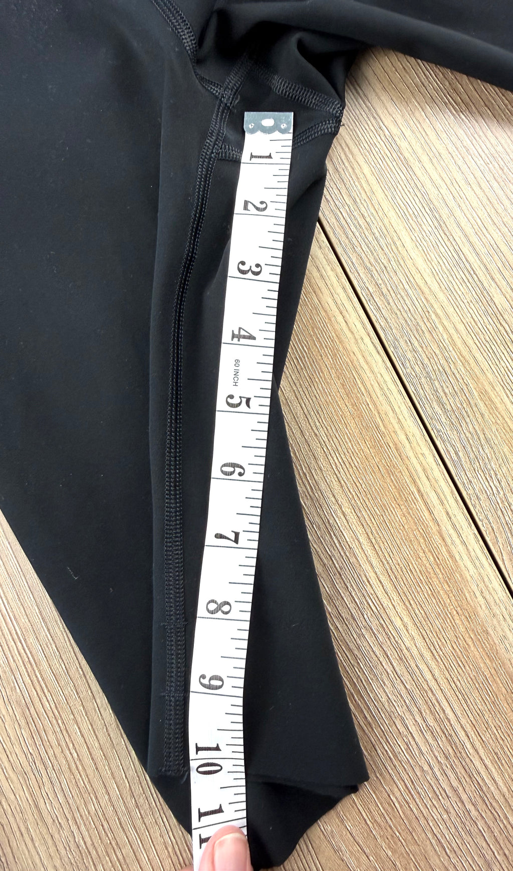 Kit and Ace black high-waist biker shorts measuring10" inseam