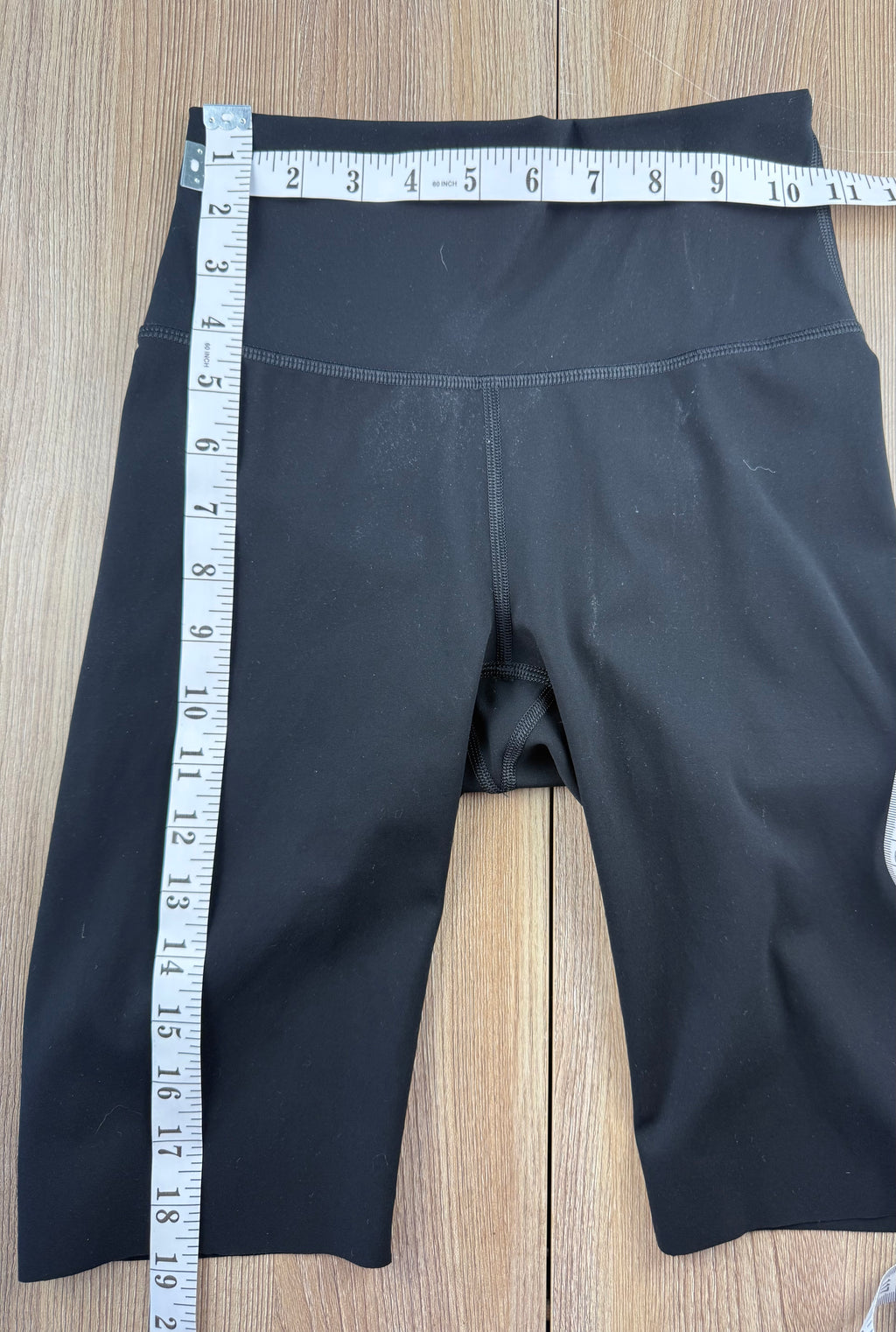 Kit and Ace black high-waist biker shorts measuring 22" waist and 19" length 