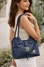 L.A.N.D. Genuine Leather Shoulder Bag on woman walking outside 