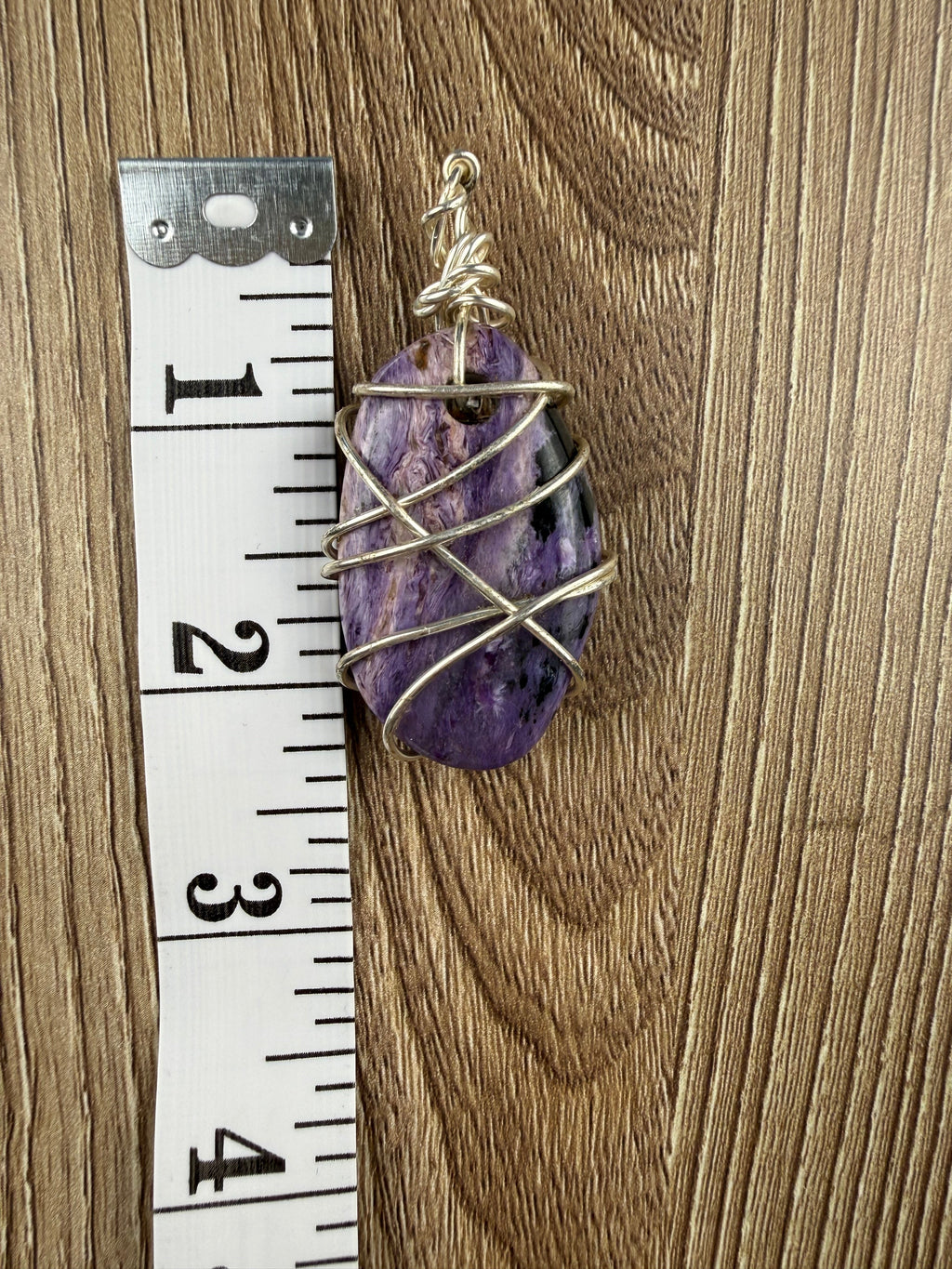 Large Genuine Charoite stone pendant wire wrapped approx 2.5"