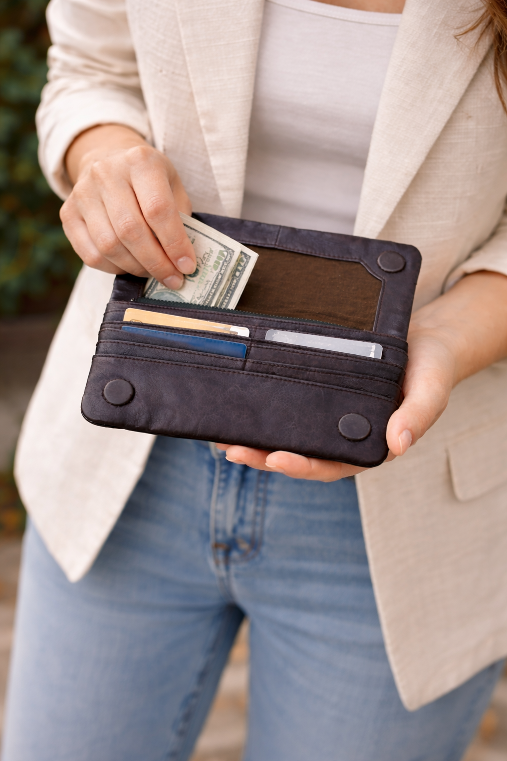 Latico Leathers Wallet shown on woman paying 