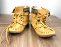 Laurentian Chief Leather Moccasins Made in Canada Leather Moccasins on desk