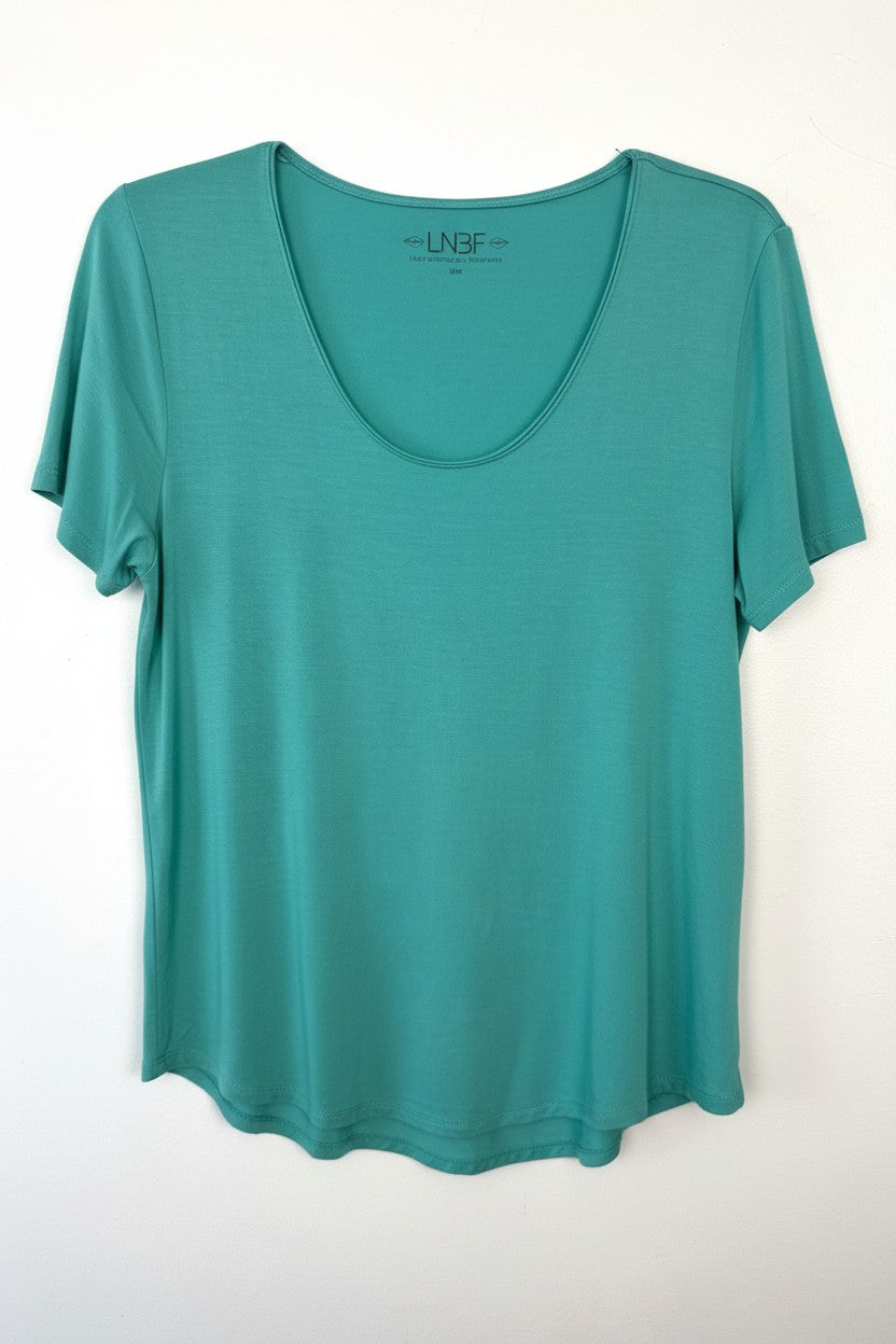 Leave Nothing But Footprints Bamboo Tee | Size M in tiffany blue  on white background
