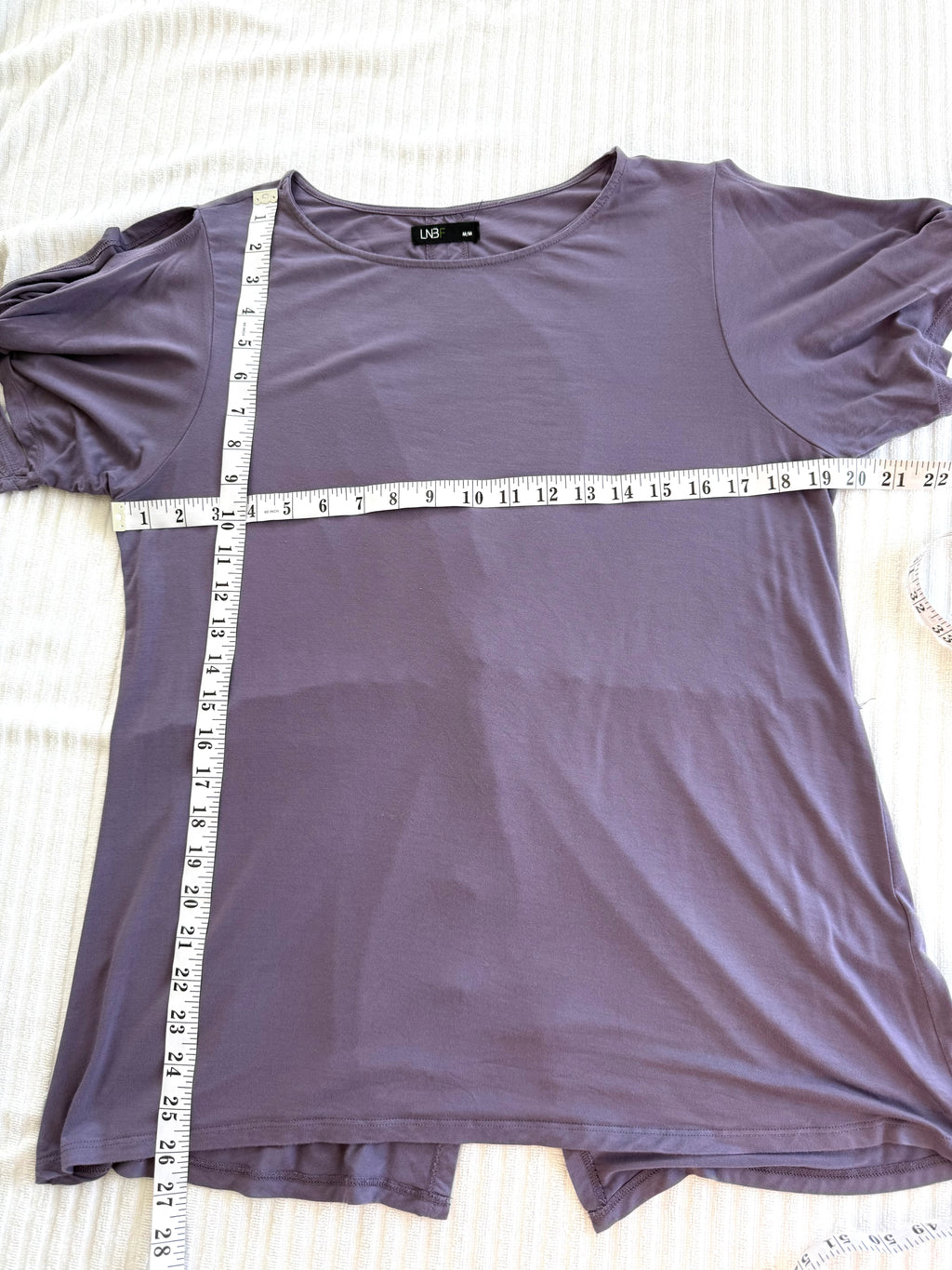 Leave Nothing But Footprints Bamboo Tee measuring 38" bust and 26" shoulder to hem