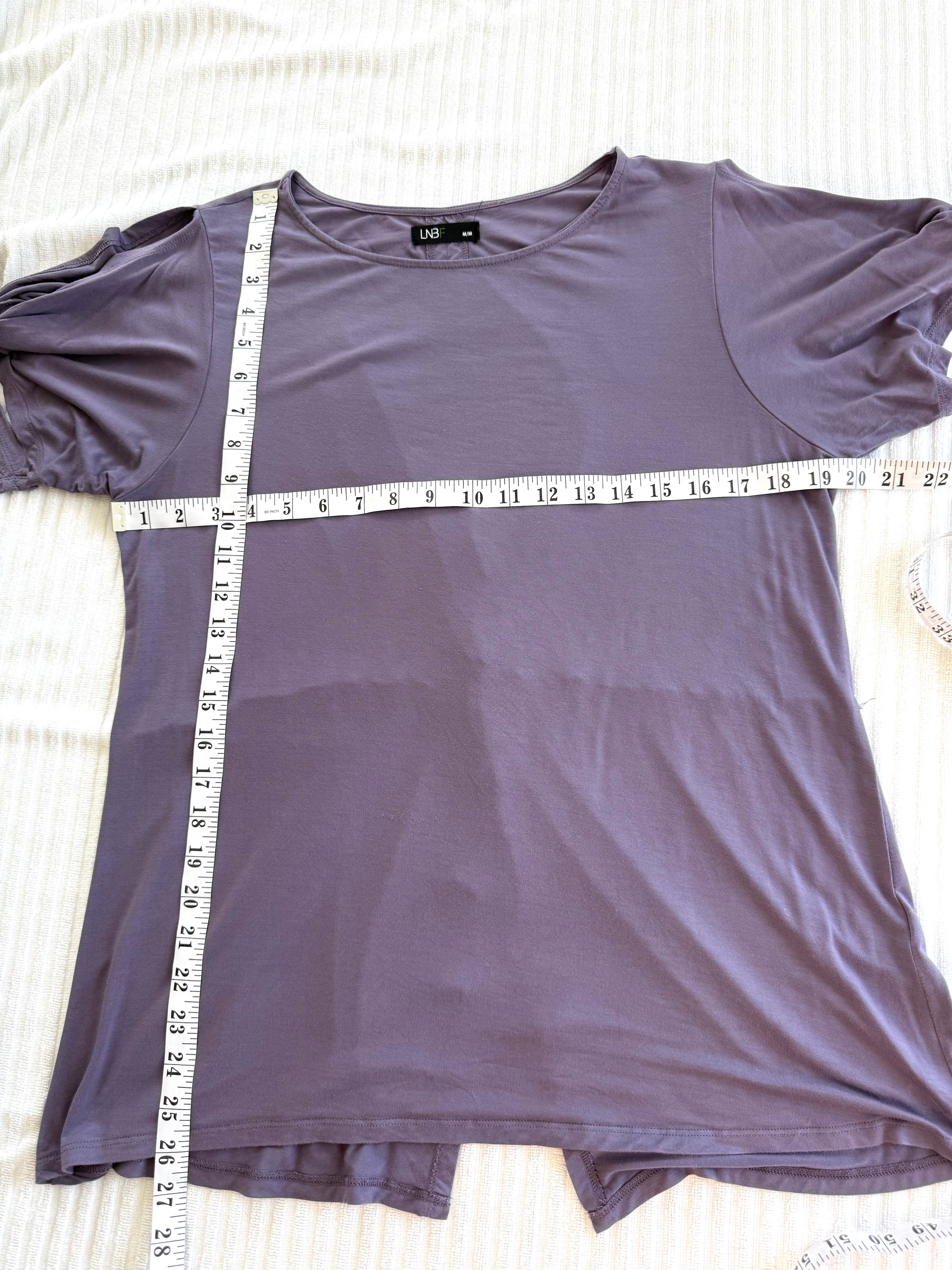 Leave Nothing But Footprints Bamboo Tee measuring 38" bust and 26" shoulder to hem
