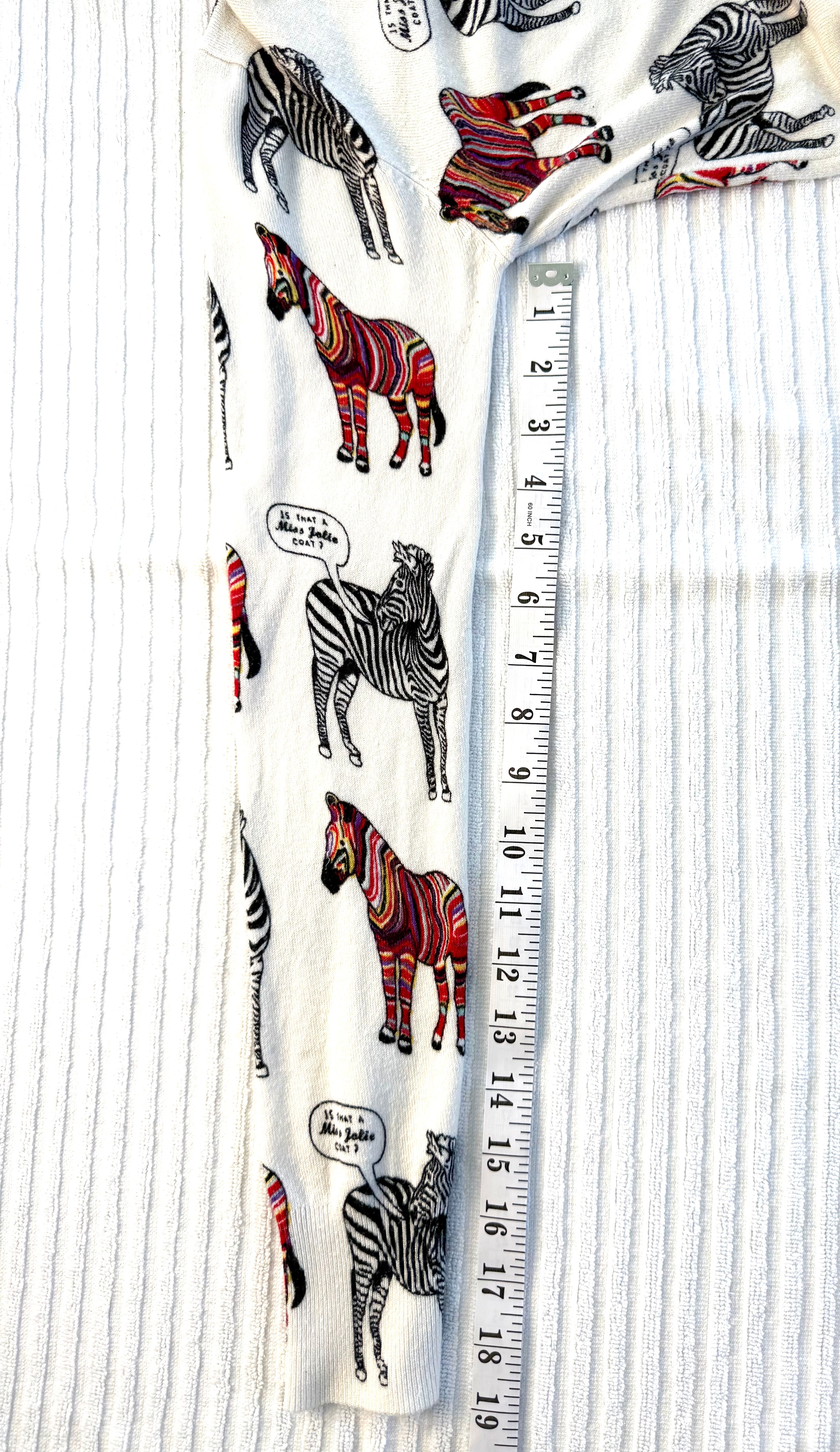 Lora Febian Novelty Zebra Print V-Neck Cardigan — Collector's Piece | Size S at Blue Sparrow Shop measuring 19" sleeve