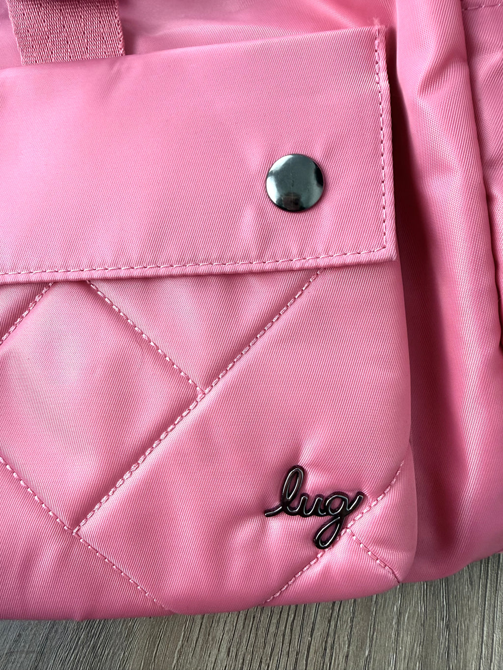 Lug logo detail on pink Wiffle backpack