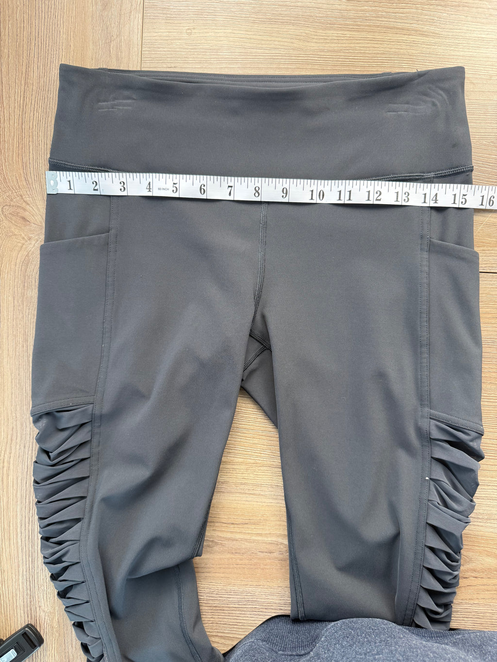 Lululemon Capris with ruched side detail | Size 8  at Blue Sparrow Shop  measuring 30" waist 