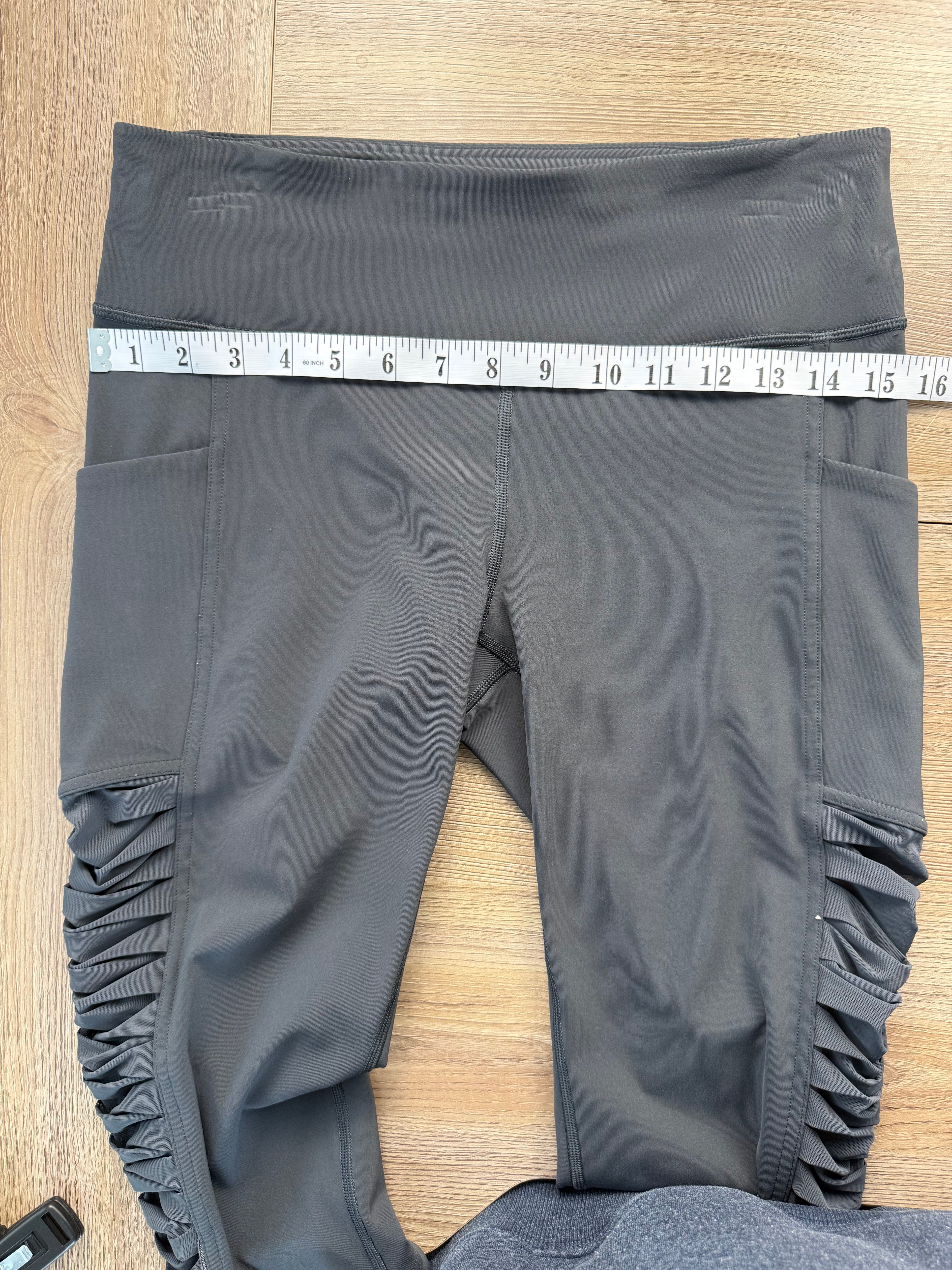 Lululemon Capris with ruched side detail | Size 8  at Blue Sparrow Shop  measuring 30" waist 