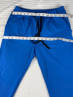 Lululemon Cobalt Blue Tapered Drawstring Pant, Size 8 | Blue Sparrow Resale Reimagined measuring 30" waist and 38" hips