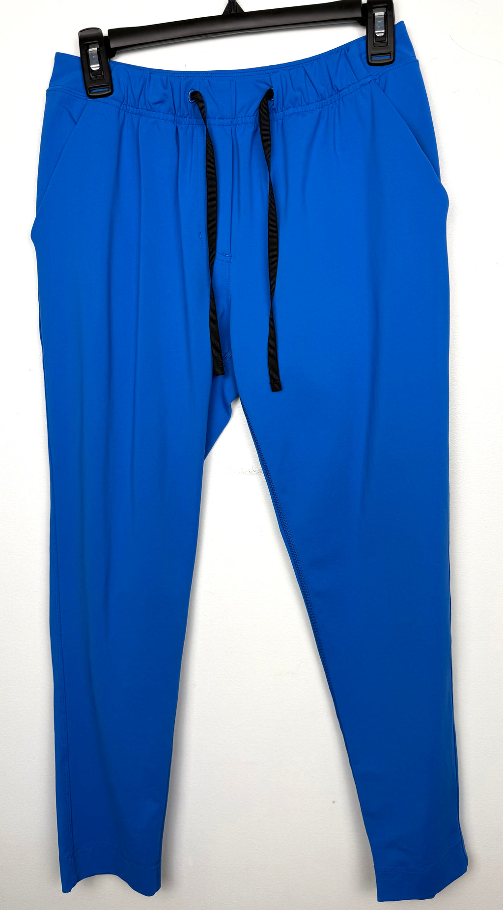 Lululemon Cobalt Blue Tapered Drawstring Pant, Size 8 | Blue Sparrow Resale Reimagined on hanger
