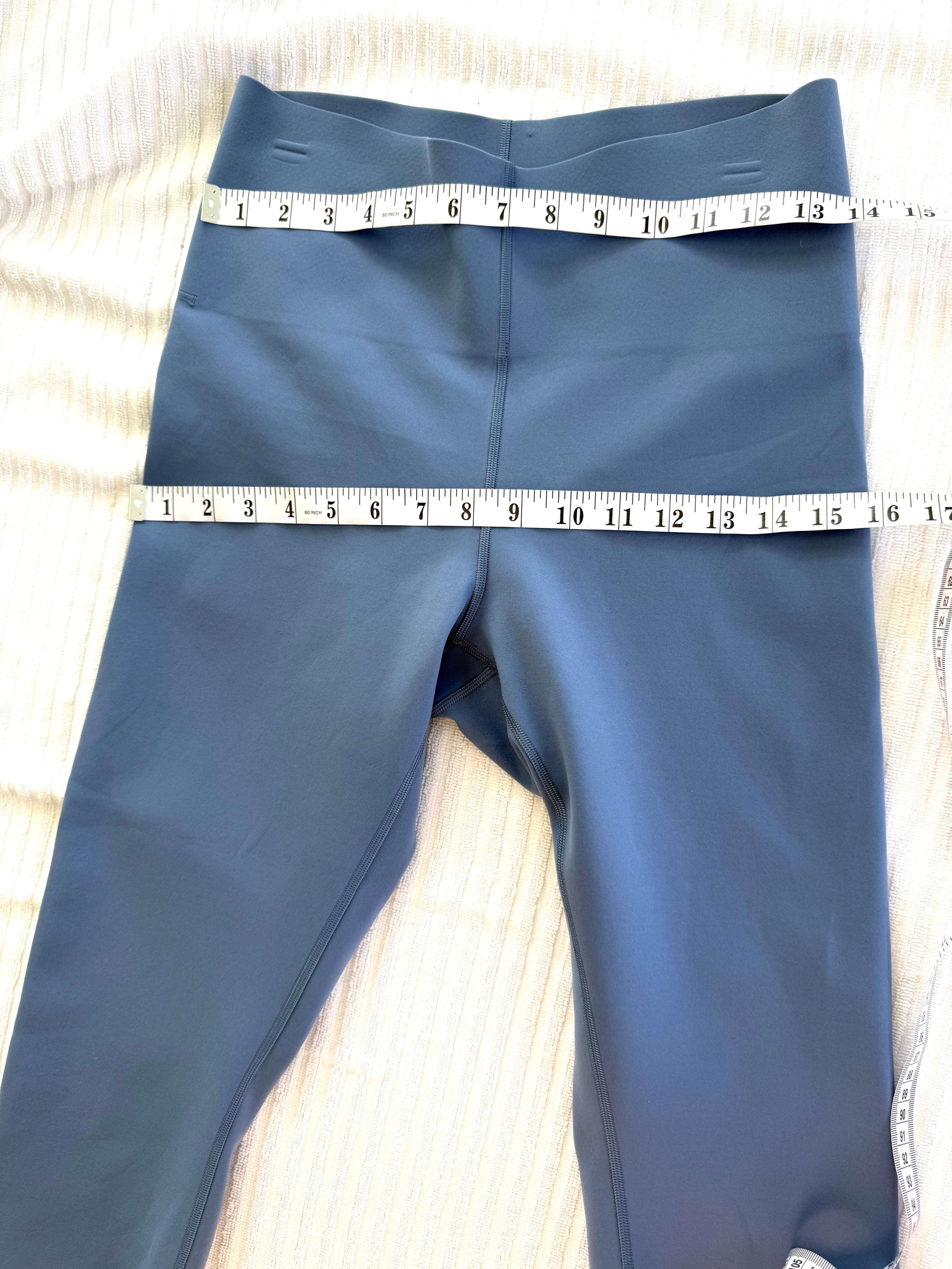Lululemon High-Rise Performance Leggings | Size 8 at Blue Sparrow Shop measuring 28" waist and 32" hips 