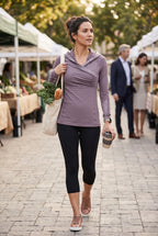 Lululemon Pullover | Size 6 on woman walking through outdoor market 
