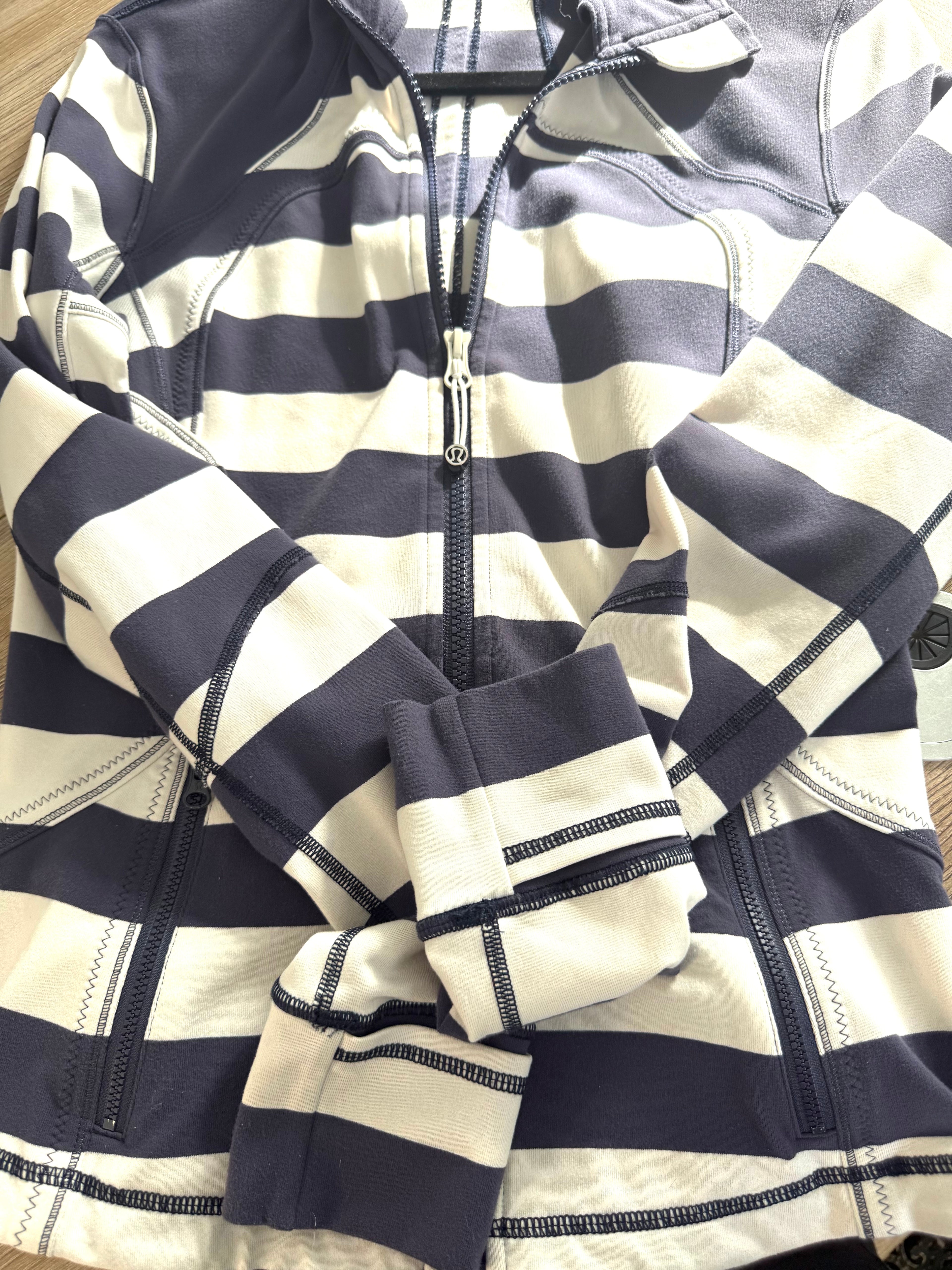 Lululemon Striped Sweater Close-up of sleeve thumbholes and seam detailing.