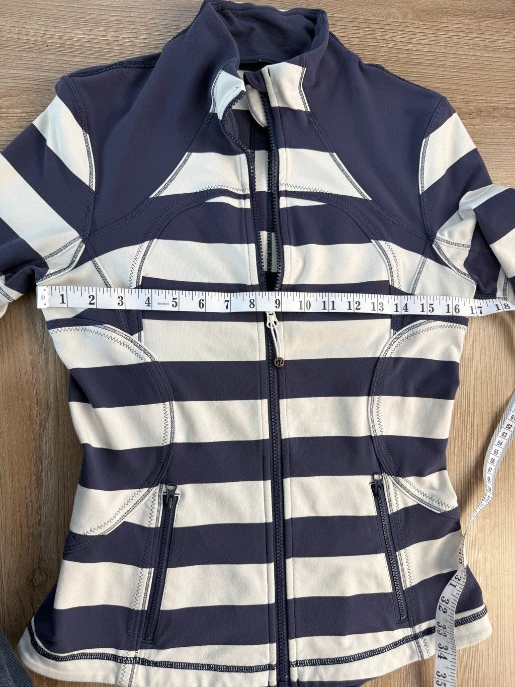 Lululemon Striped Zip up sweater measuring 34" bust