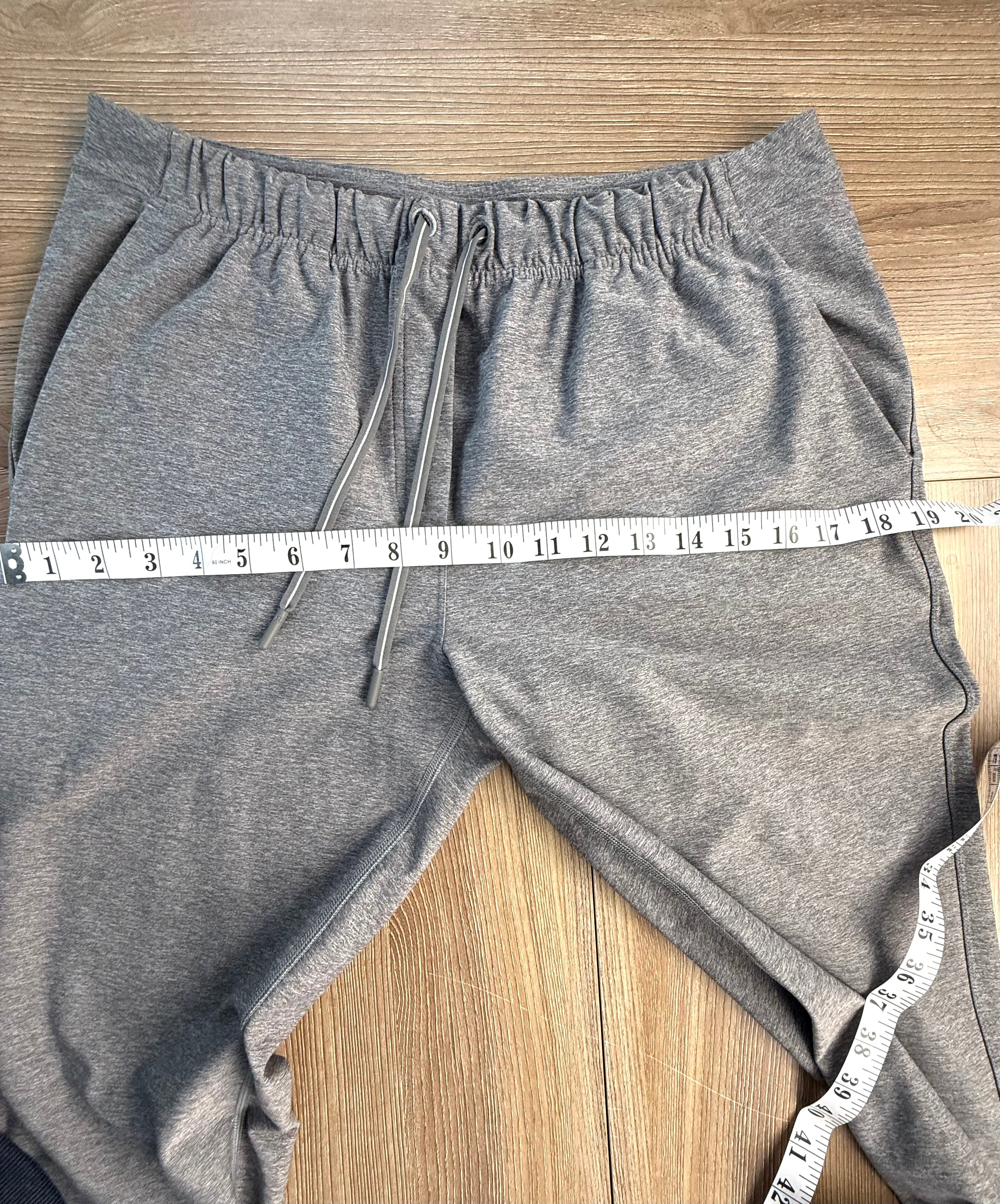 Lululemon drawstring waist pocketed pants measuring 38" hips