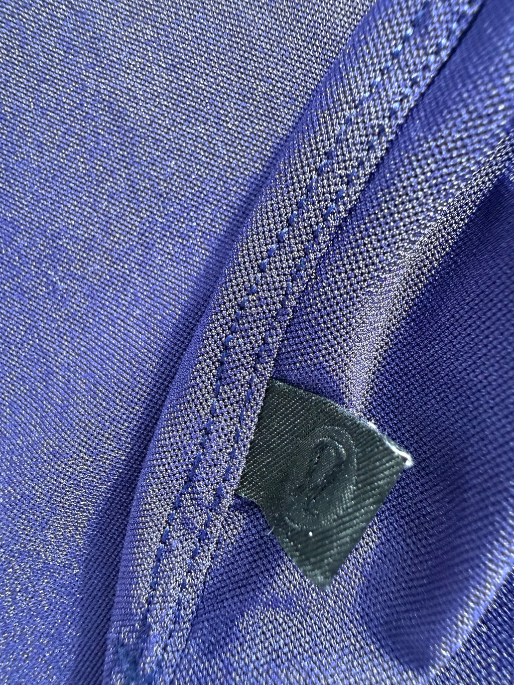 Lululemon logo detail purple athletic shirt