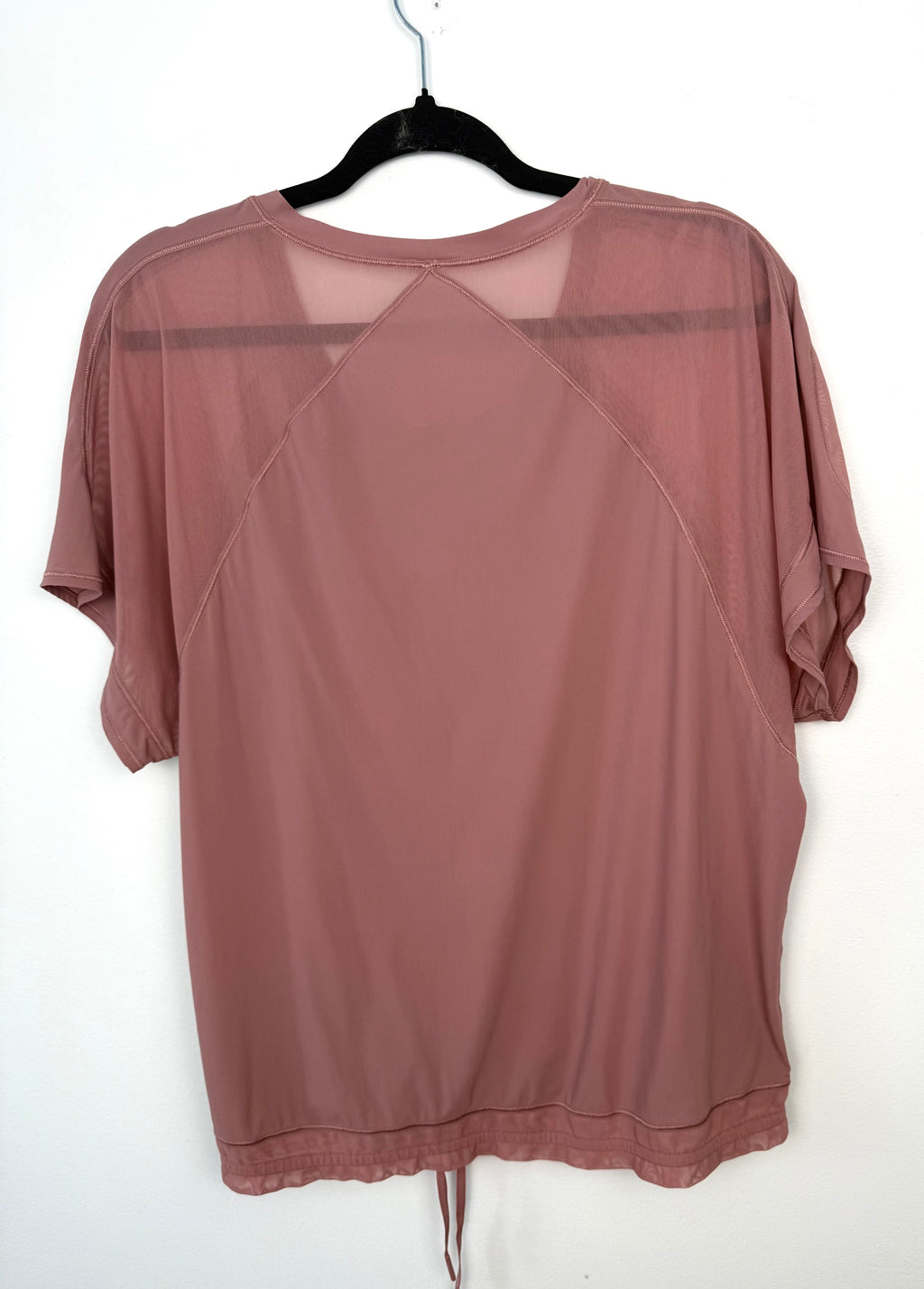 Lululemon mauve workout tee back view with mesh detail
