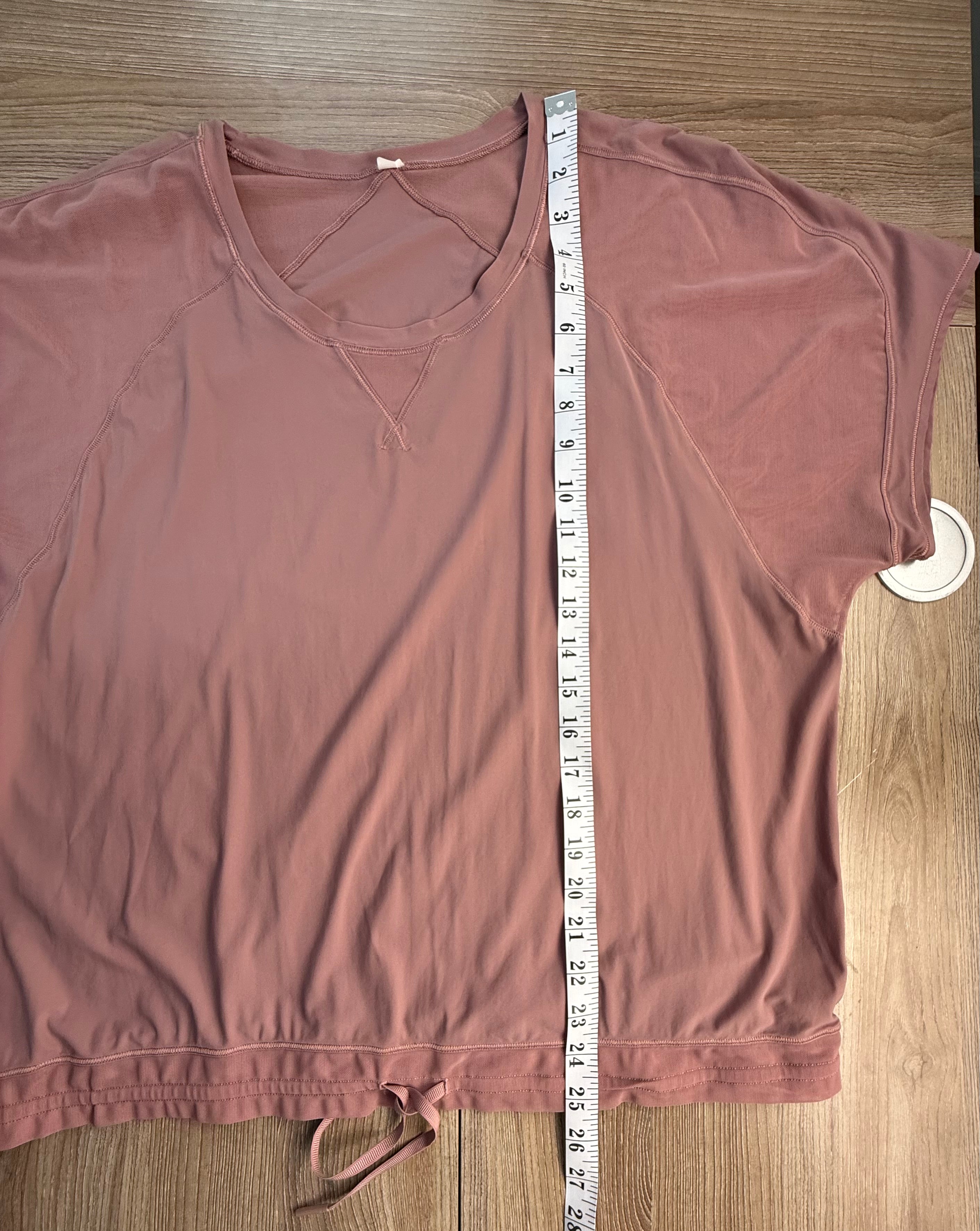 Lululemon short sleeved workout top measuring 25" from shoulder to hem