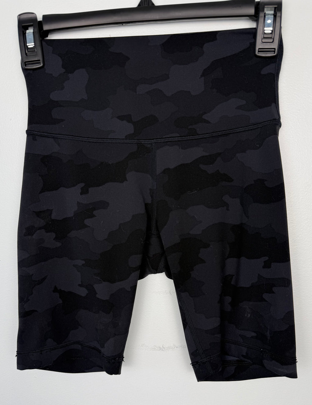 front of Lululemon shorts grey on black camo pattern at Blue Sparrow Shop on hanger