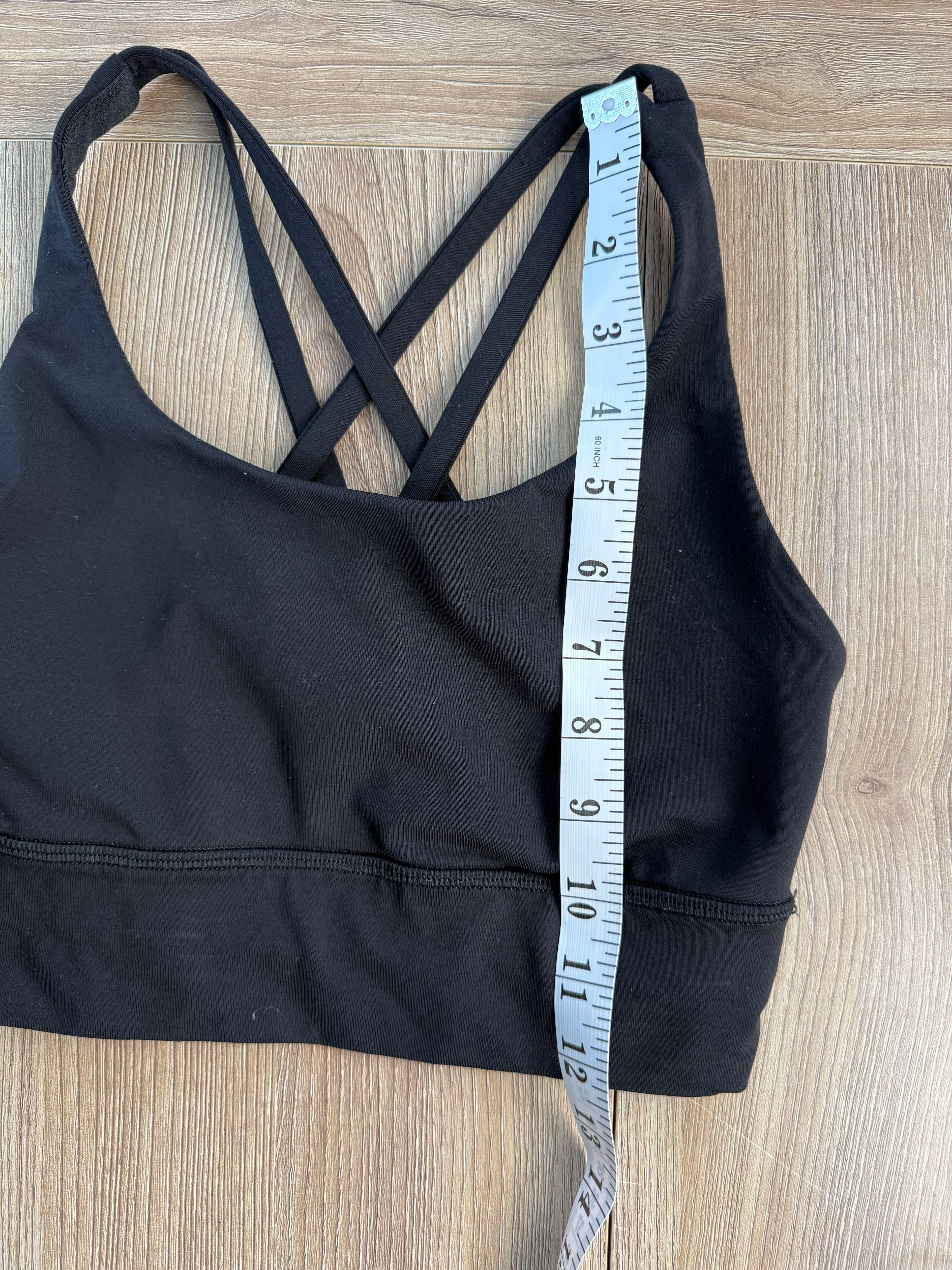 Lululemon sports bra measuring 12 inches from shoulder strap to bottom band