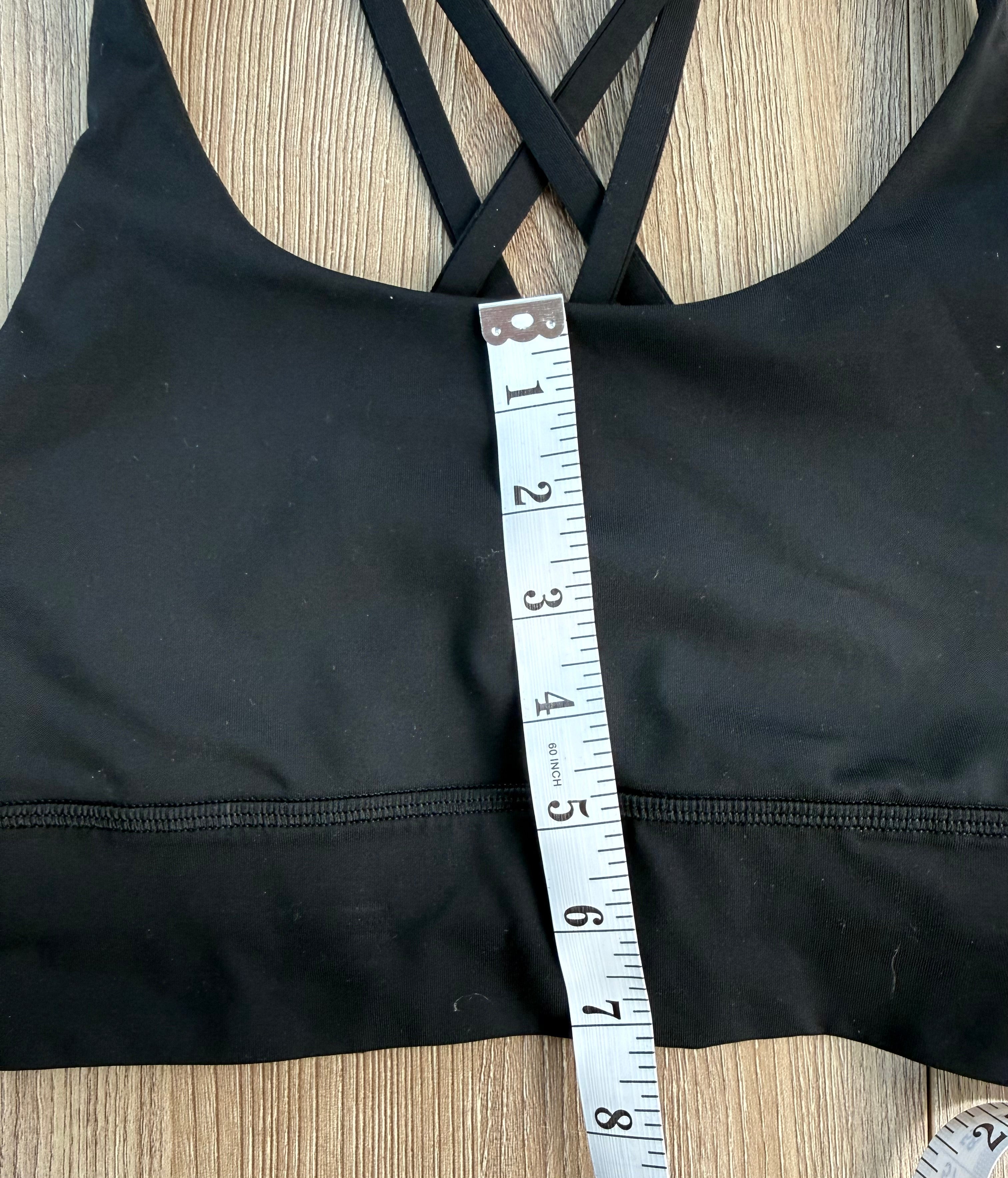 Lululemon sports bra measuring 7" from top of bra to bottom band 
