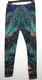Luxury Camilla Franks resort wear leggings featuring a vibrant animal print design with crystal embellished ankle detailing on hanger