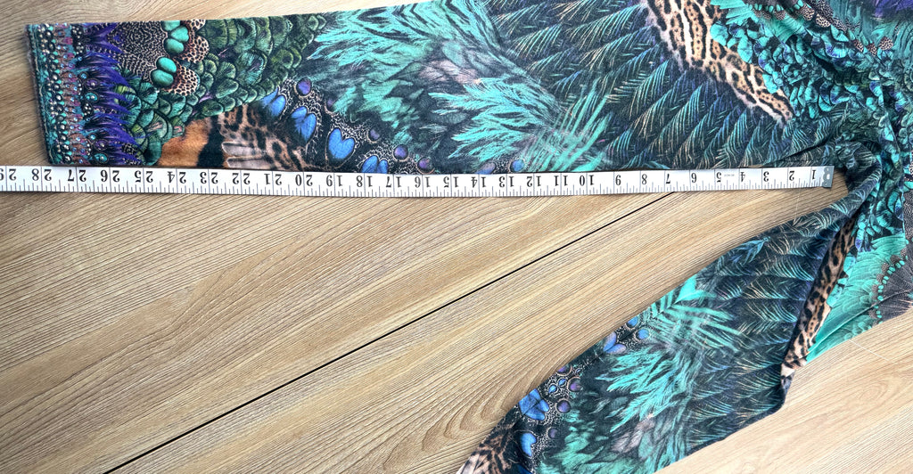 Luxury Camilla Franks resort wear leggings featuring a vibrant animal print design with crystal embellished ankle detailing measuring 28" inseam