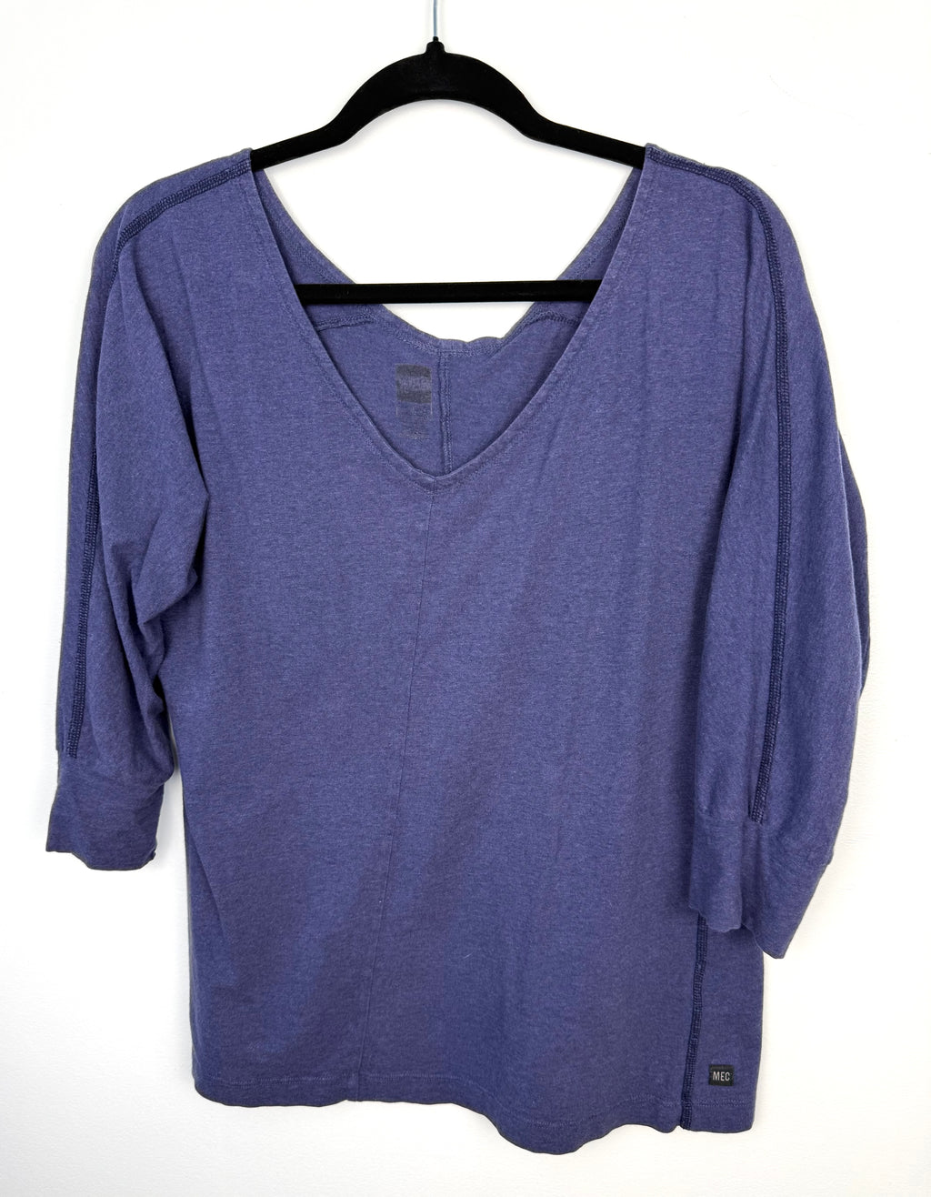 MEC Organic Cotton Long Sleeve Top in blue  on hanger