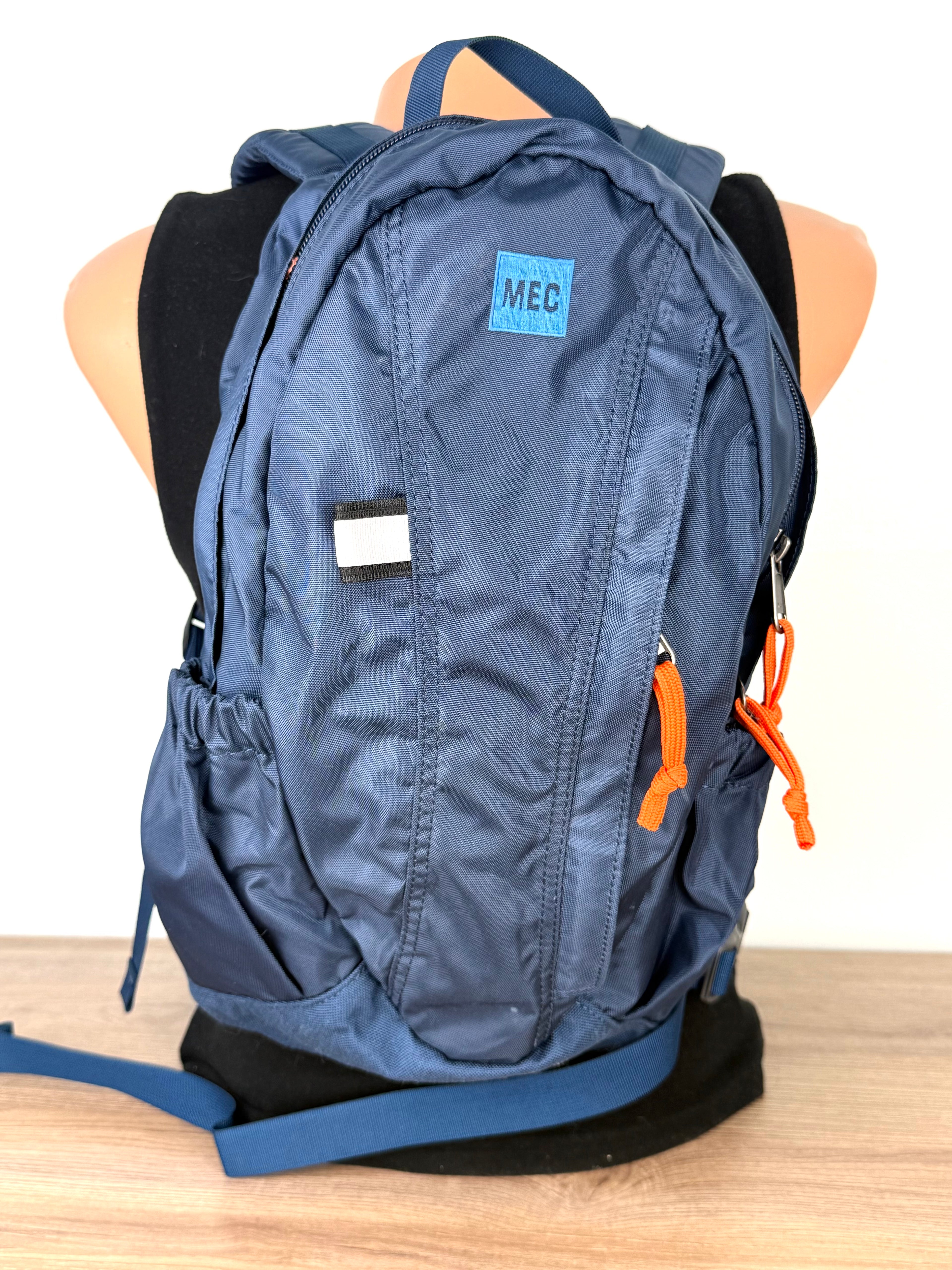 MEC daypack - mini MEC travel backpack  on mannequin for scale 
