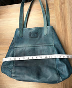 Made in Canada  Kunitz handcrafted leather tote bag measuring approx 14" wide when it folds in on itself when you carry it 