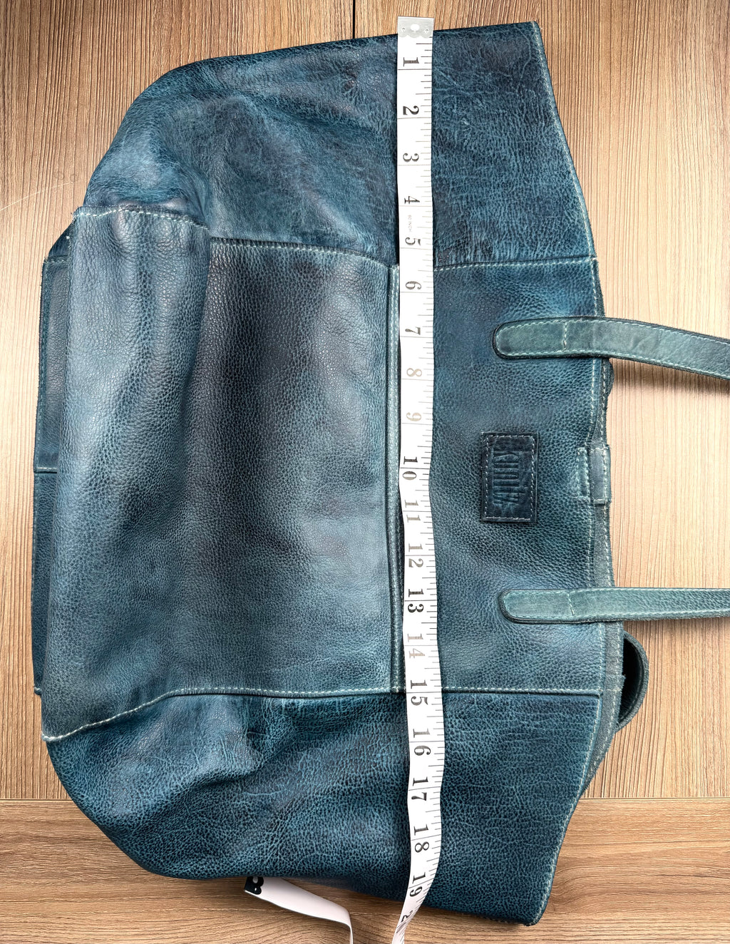 Made in Canada  Kunitz handcrafted leather tote bag measuring approx 19" wide when expanded