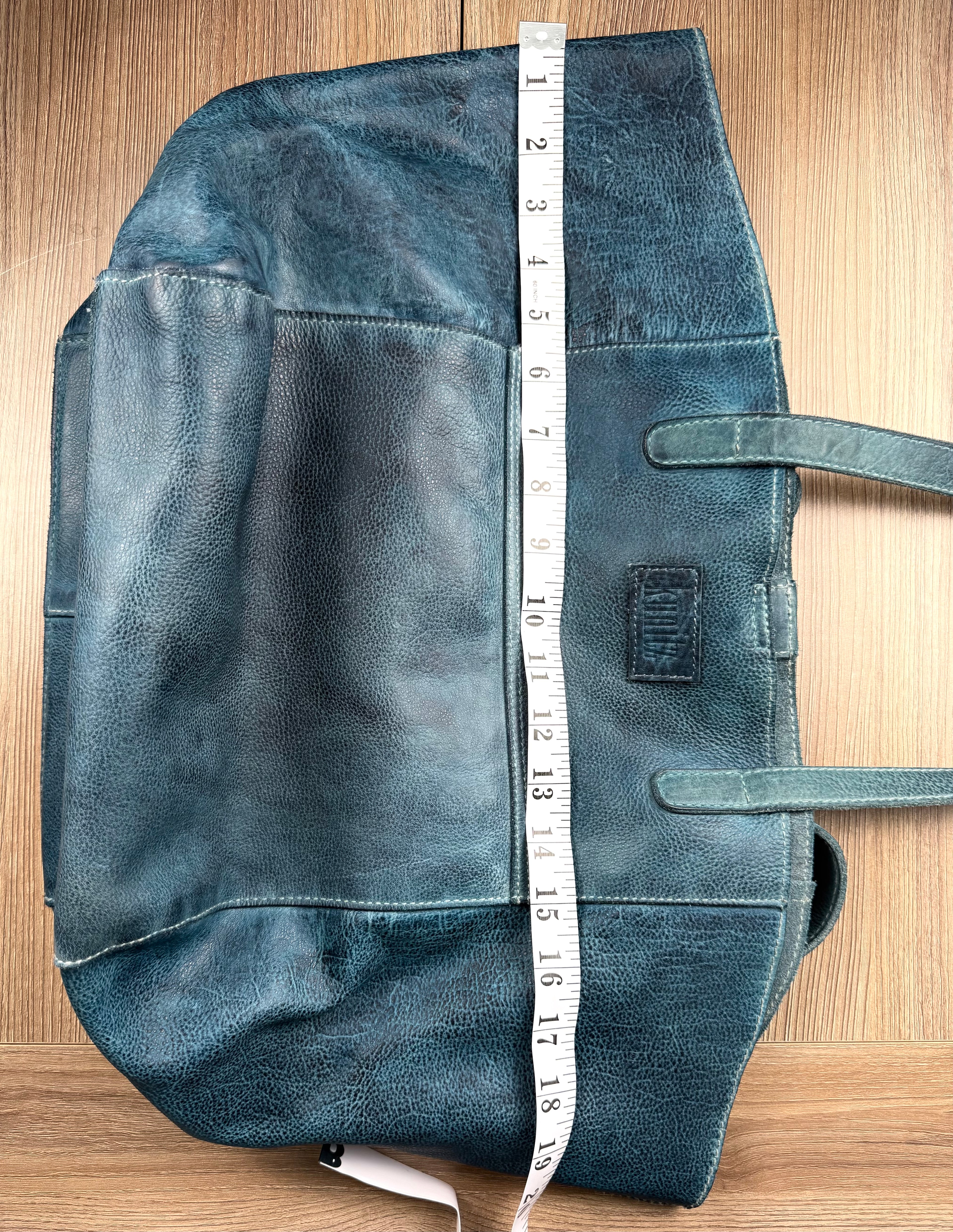 Made in Canada  Kunitz handcrafted leather tote bag measuring approx 19" wide when expanded