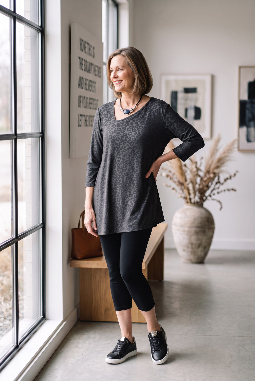 Made in Canada Sympli Asymmetrical 3/4 Sleeve Top | Size 14 on woman wearing leggings standing by window